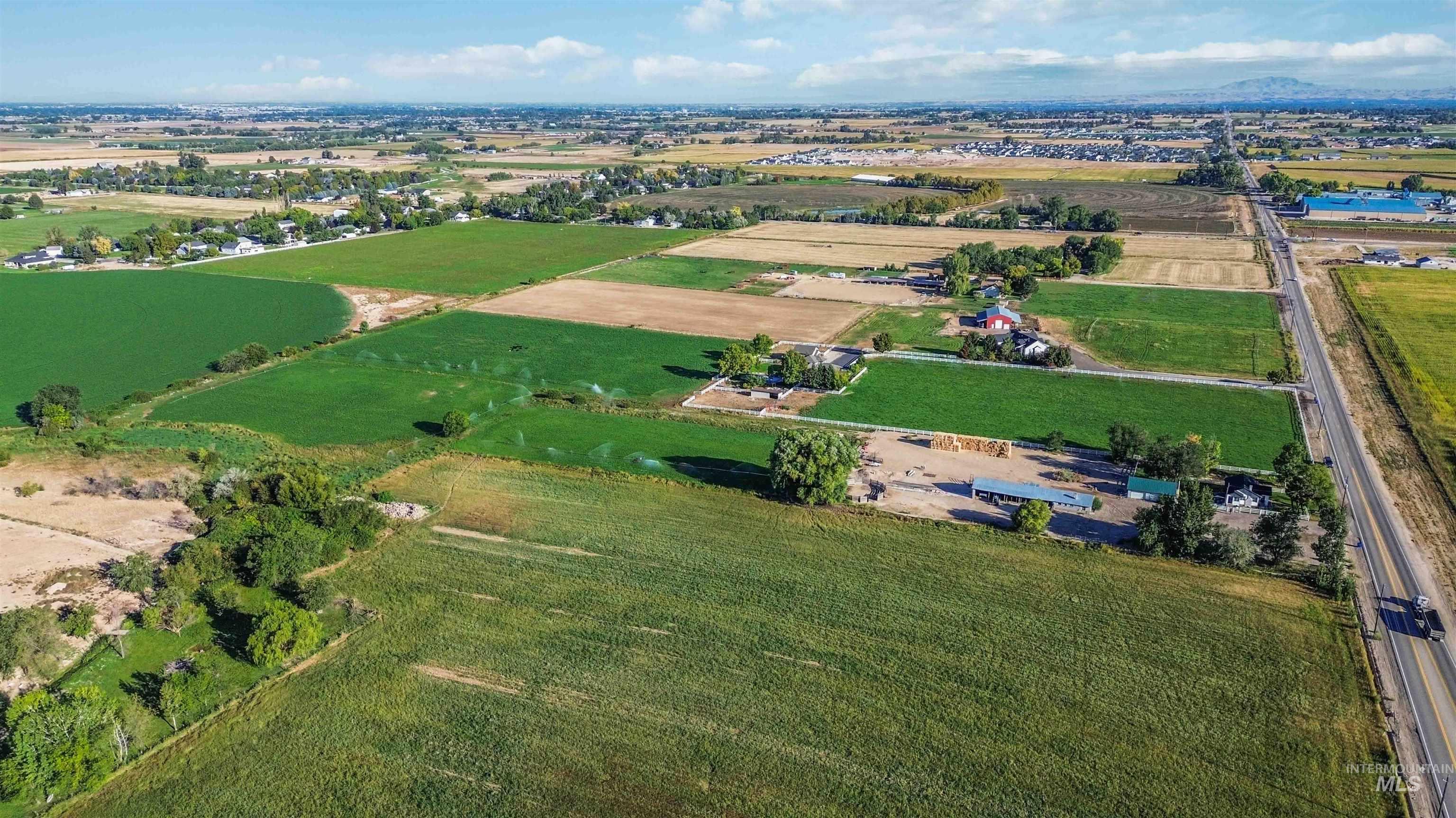 Aerial overview of property's location featuring rural landscape