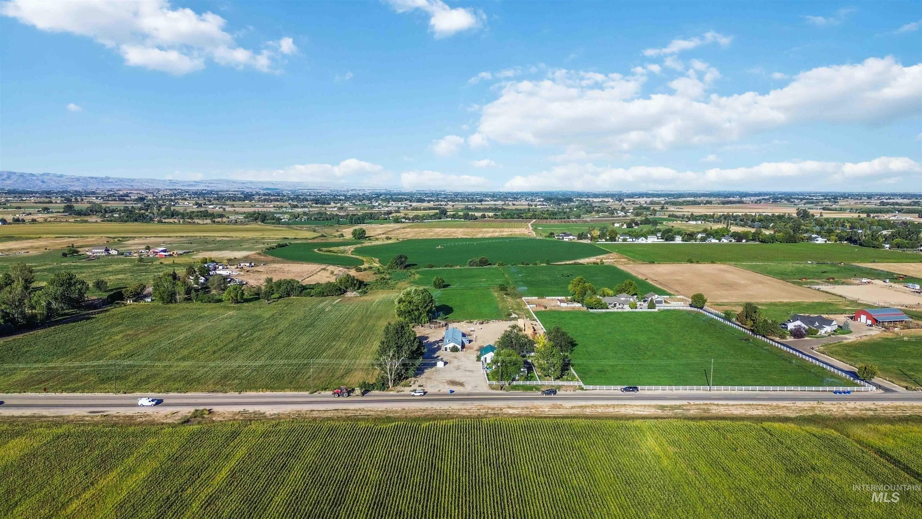 Overview of rural landscape with rows of crops