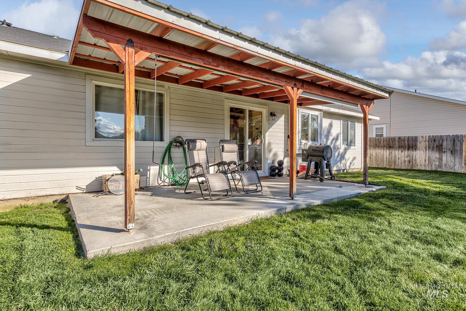 View of patio / terrace featuring a grill