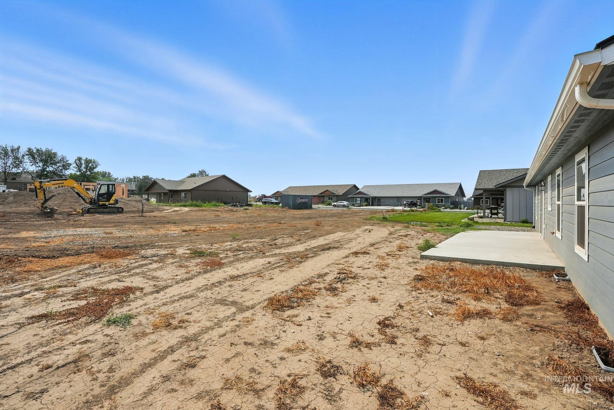 View of yard with a residential view and a patio area