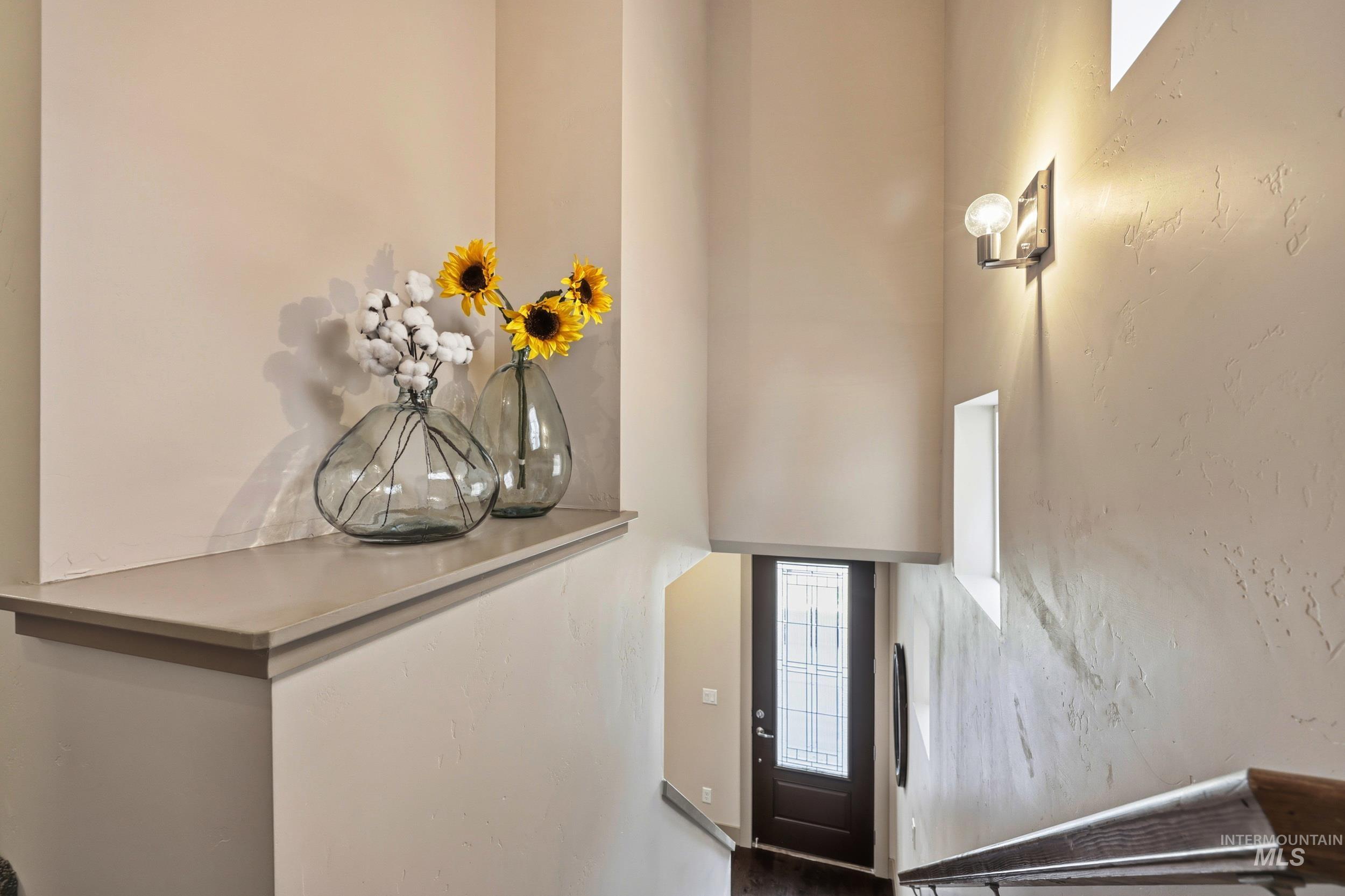 Entryway featuring a towering ceiling