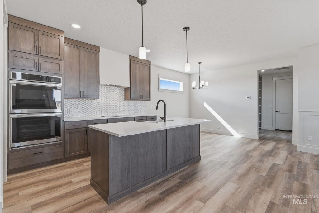 Photo of 410 Mayfield Springs Blvd, Boise, ID 83716 (MLS # 98982075)