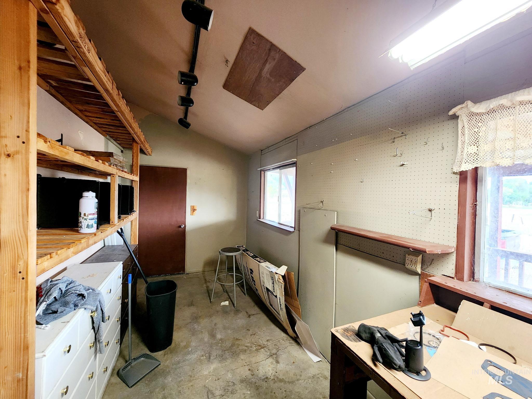 The back room offers potential to become a bedroom, or you could transform the guest house into a private studio apartment