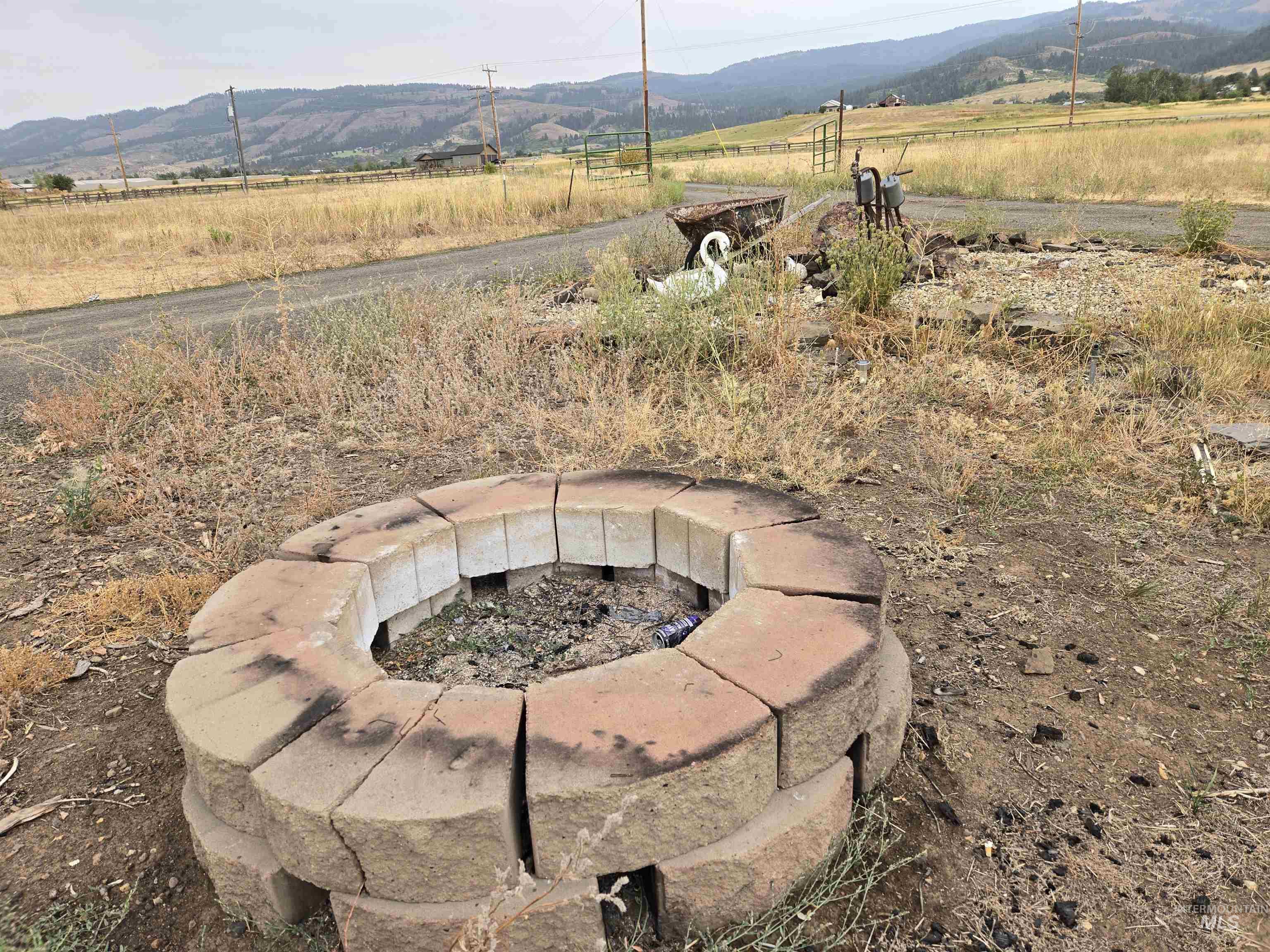 Fire pit creates a welcoming space for outdoor entertaining."