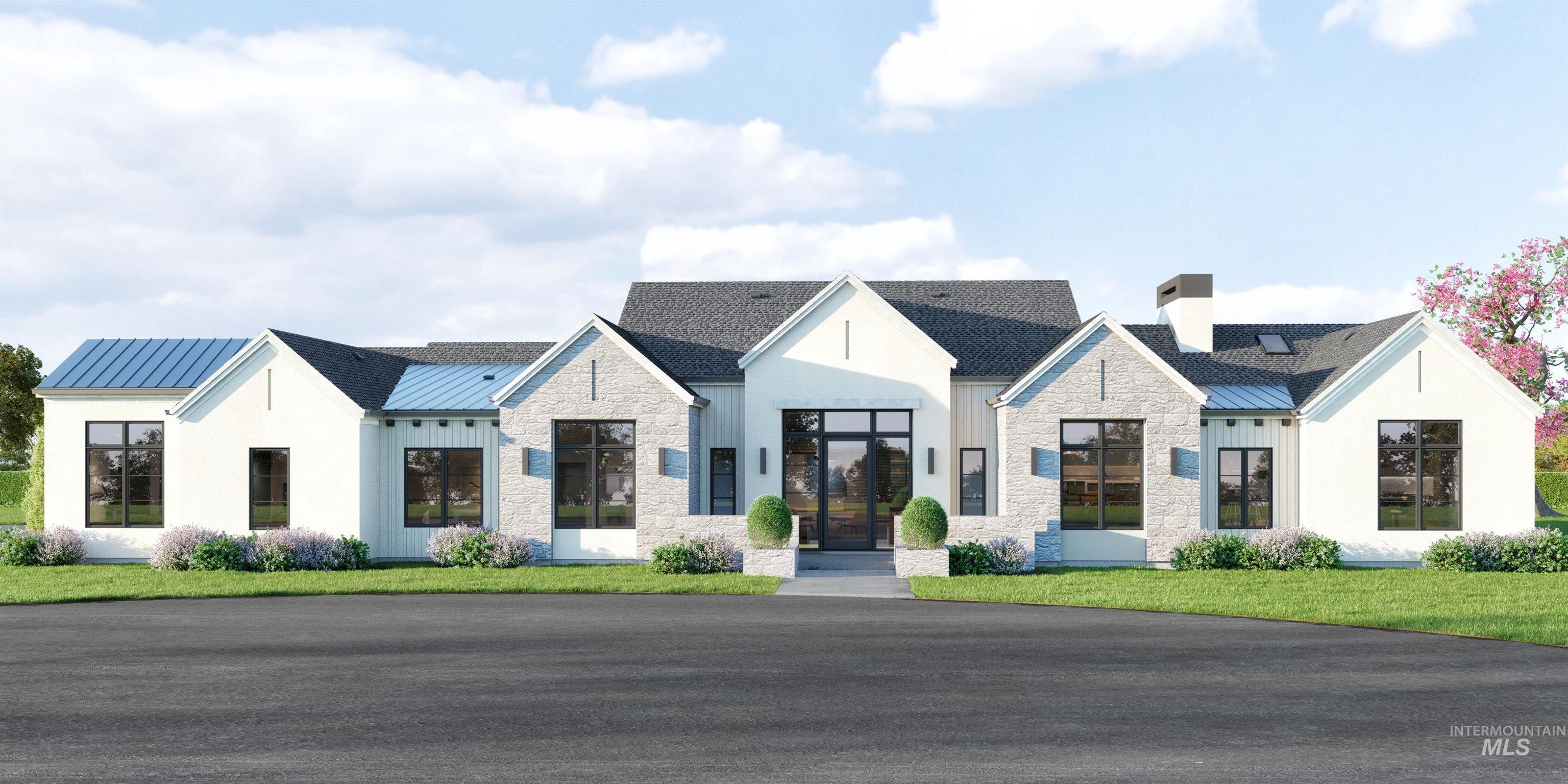 Modern farmhouse featuring a standing seam roof, a metal roof, stone siding, and a chimney