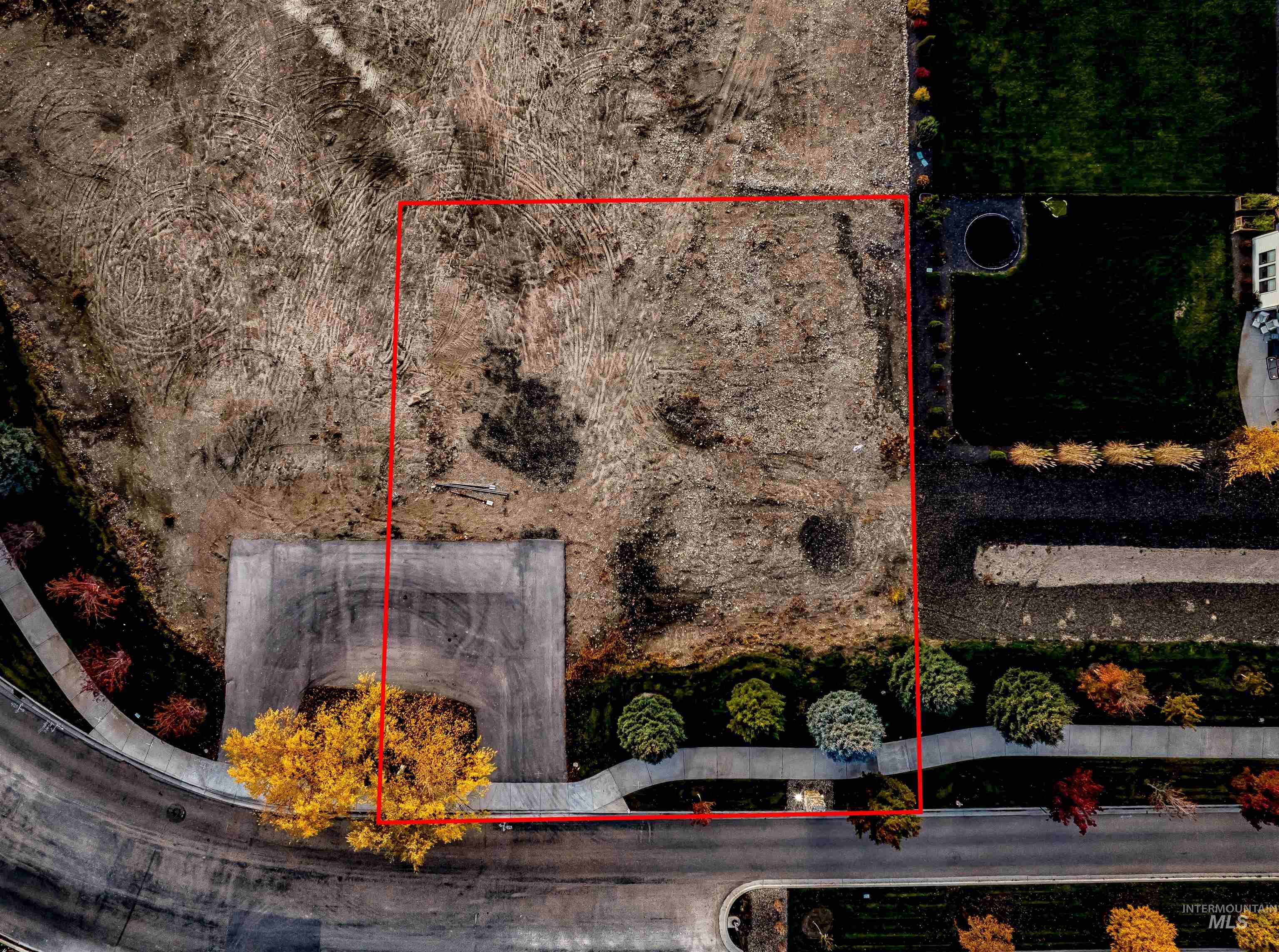 Aerial map of property and surrounding area featuring property parcel outlined