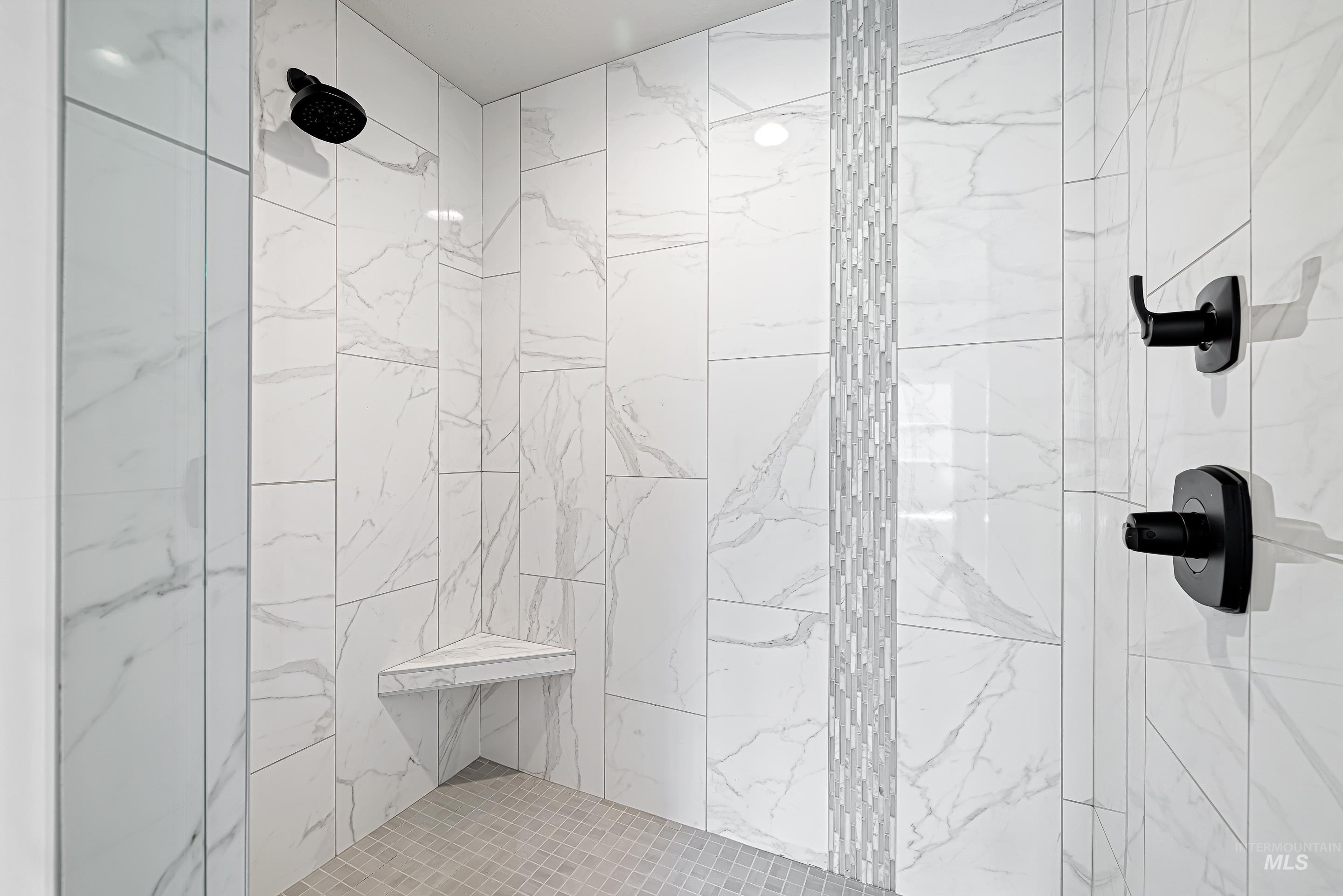 Full bathroom with a stall shower