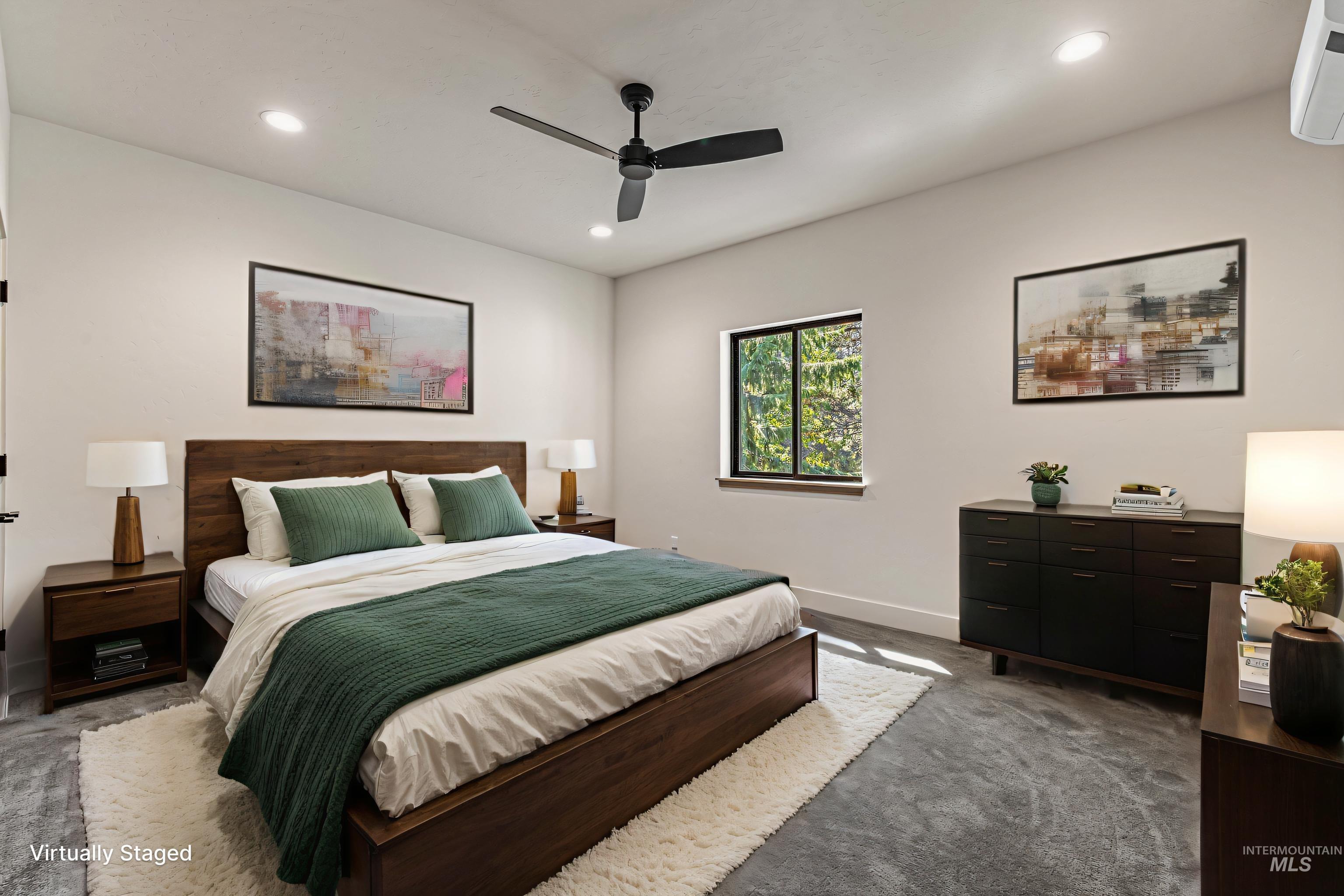 Bedroom featuring dark carpet, ceiling fan, and recessed lighting