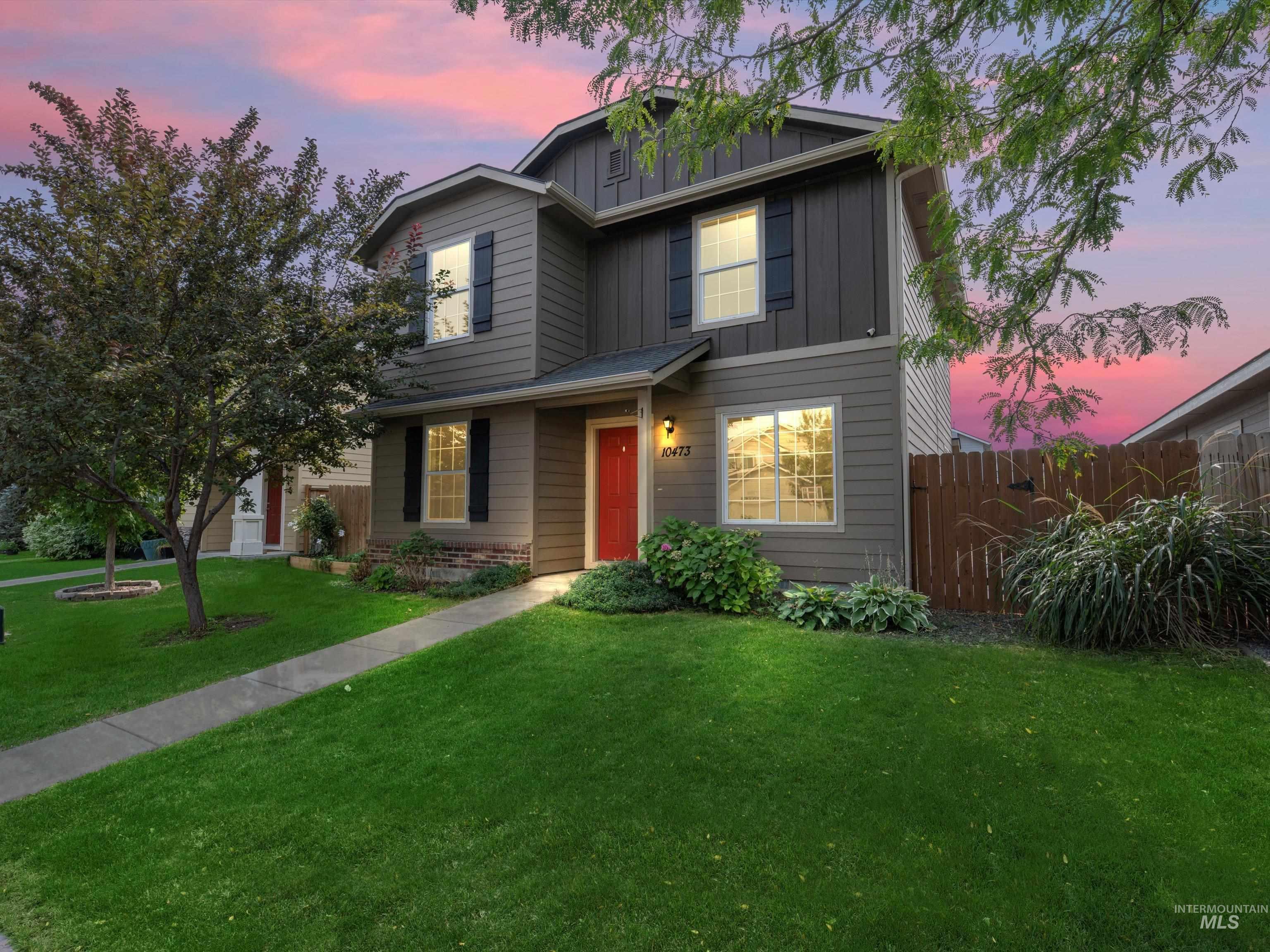 Traditional-style house featuring board and batten siding