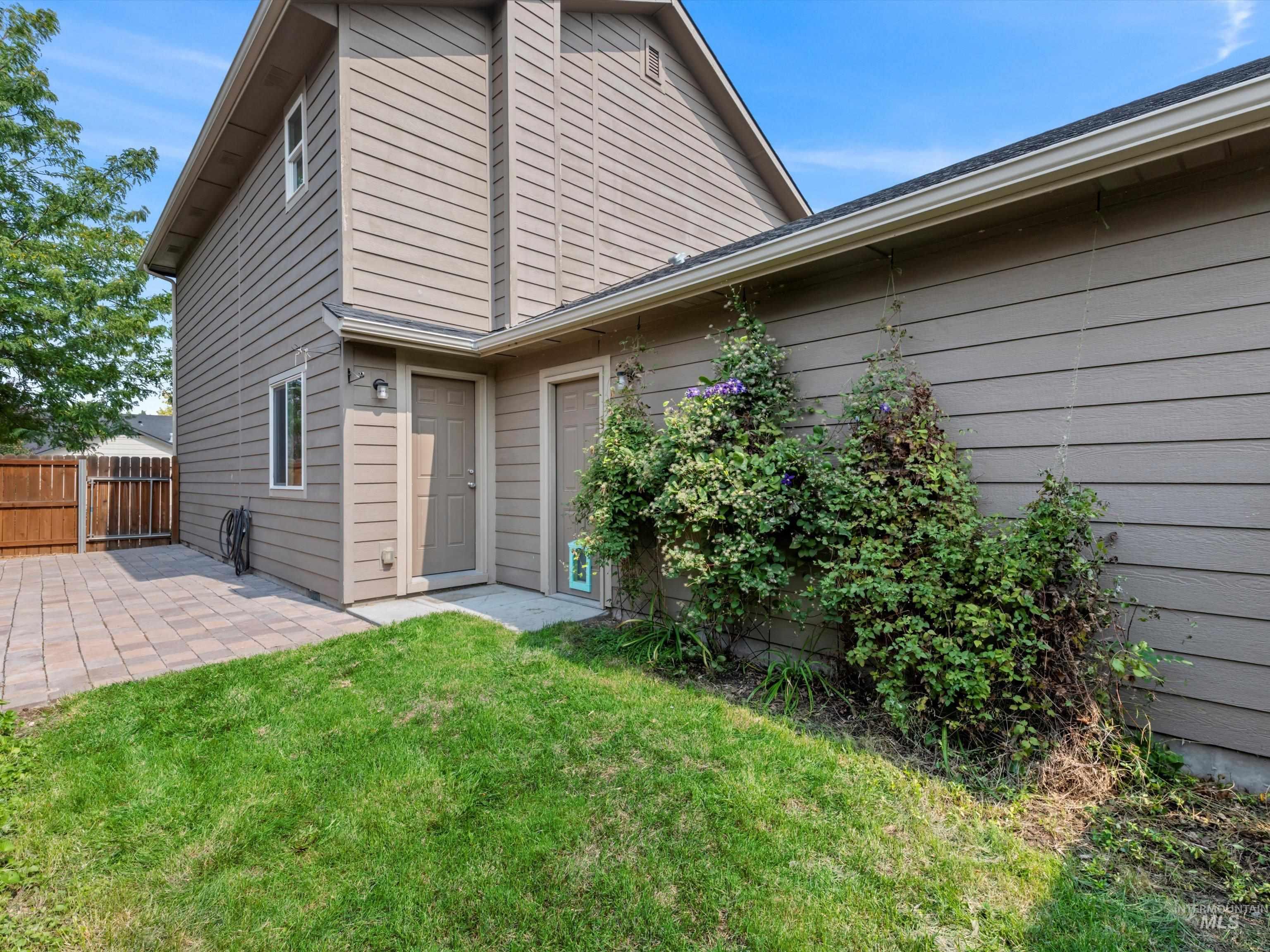 Rear view of property with a patio