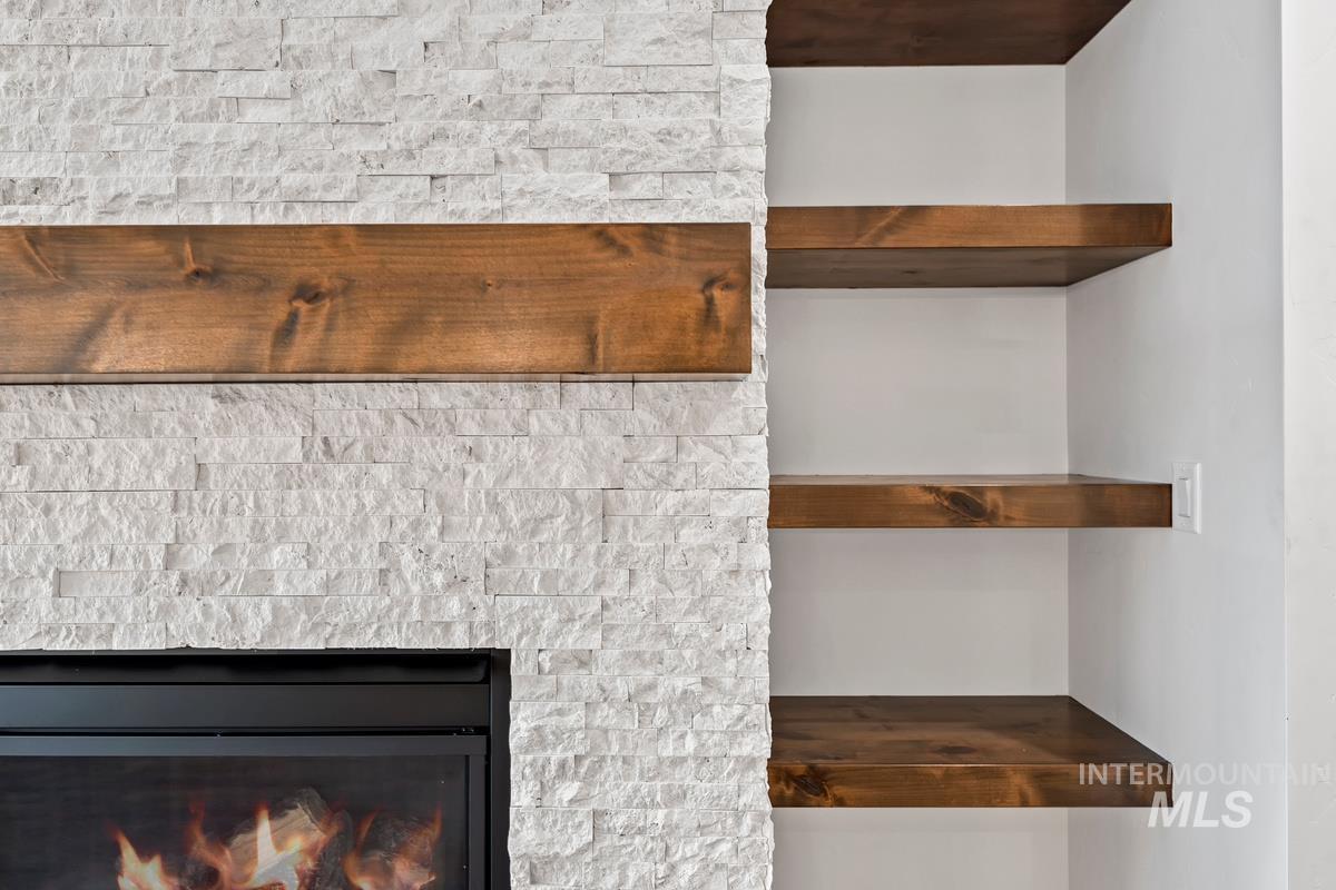 Detailed view of a glass covered fireplace