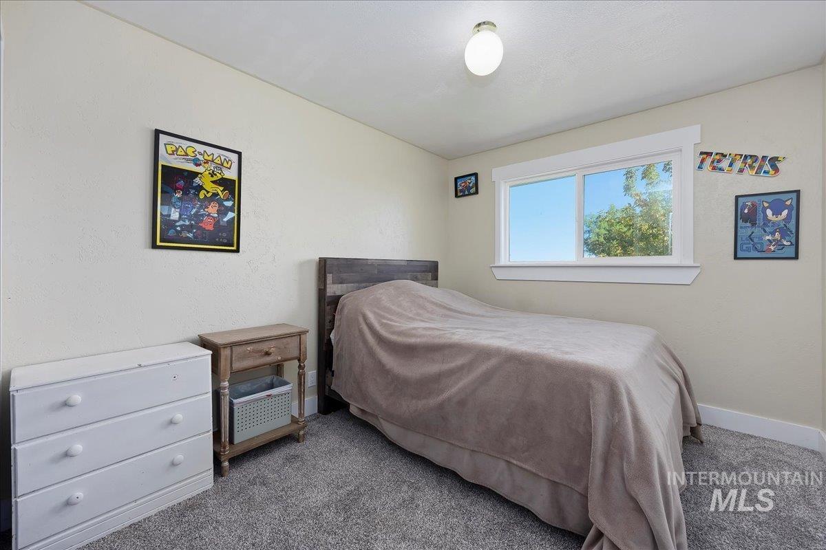 Bedroom featuring carpet flooring