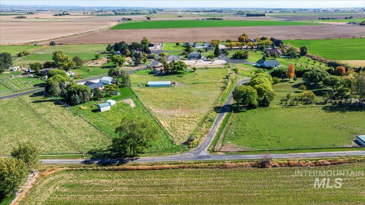 Overview of rural landscape featuring extensive farmland