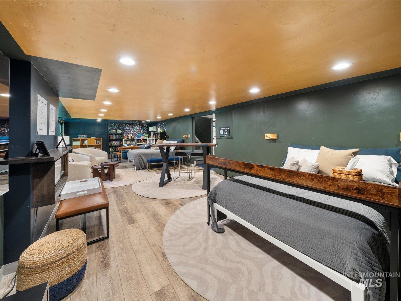Bedroom featuring light wood-style floors and recessed lighting