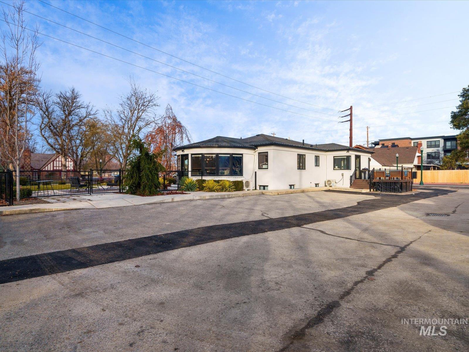View of front facade featuring a gate