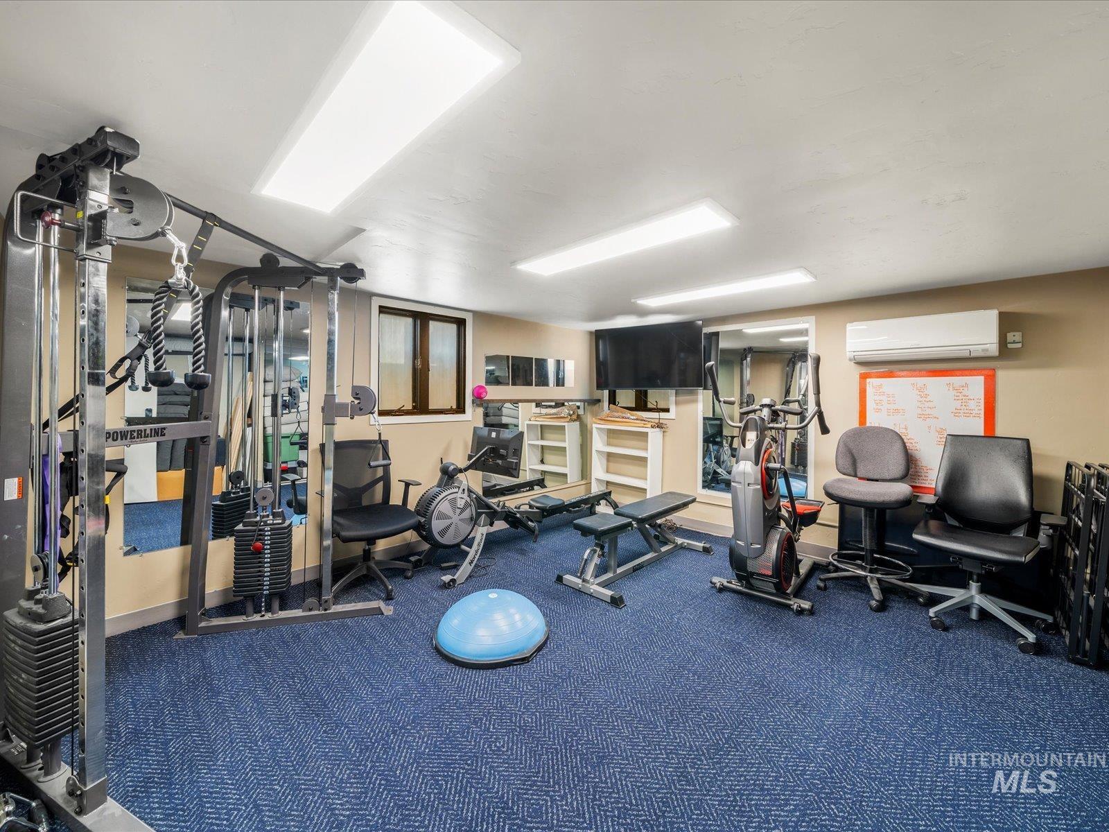 Gym with an AC wall unit