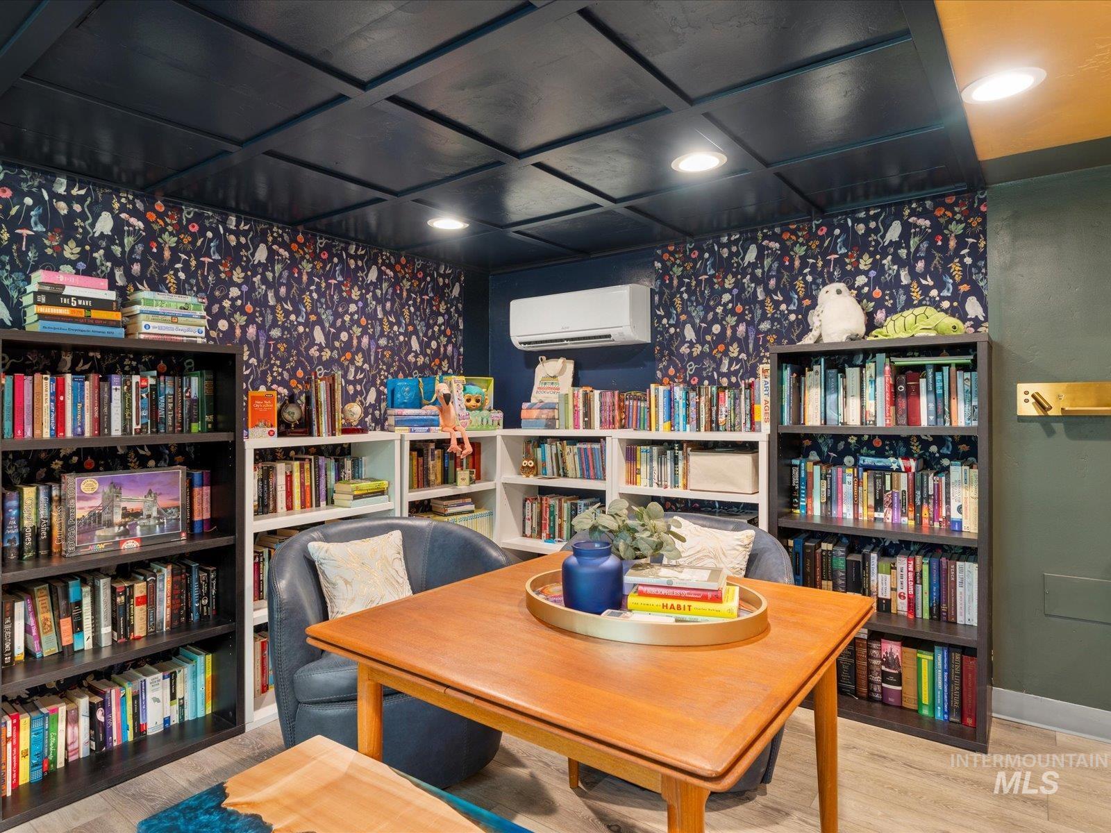 Office area with wood finished floors, a wall mounted AC, recessed lighting, and wallpapered walls