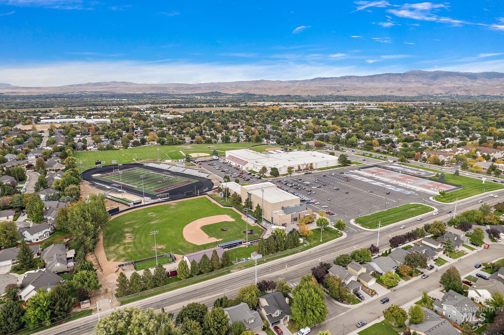 Aerial perspective of suburban area with mountains