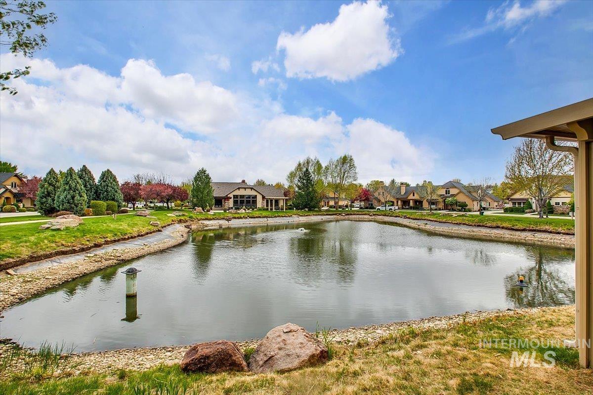 Water view featuring nearby suburban area