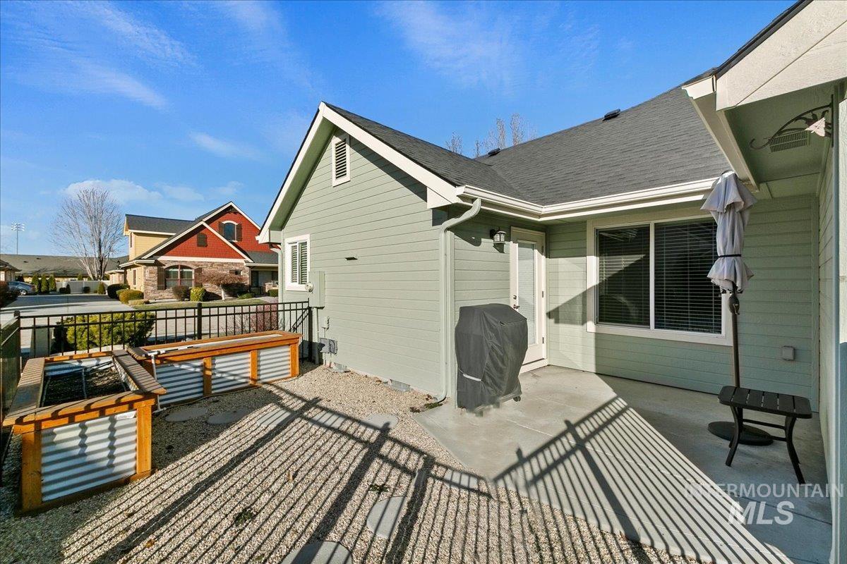 Wooden deck with a patio and grilling area