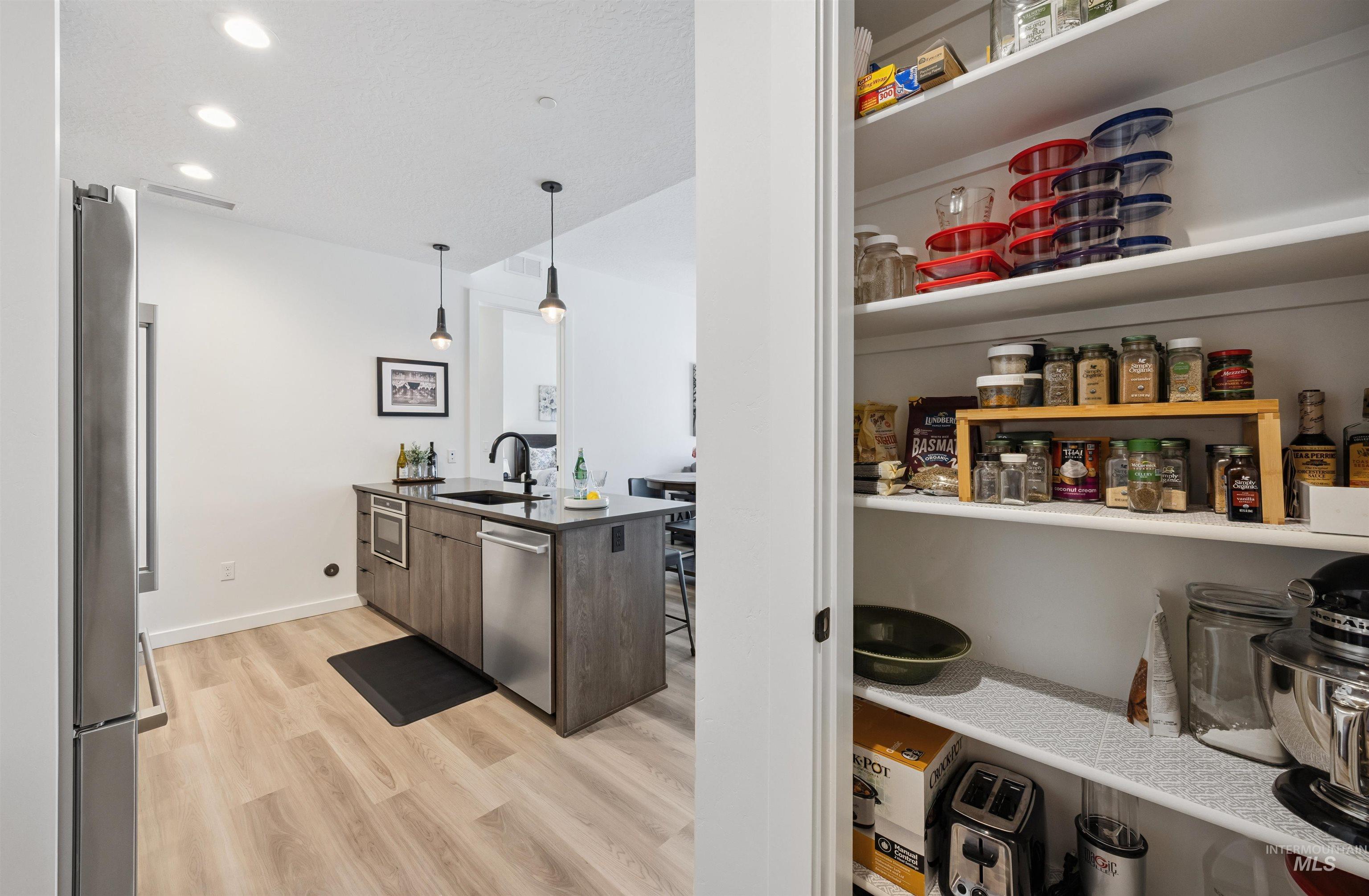 Storage area featuring a sink