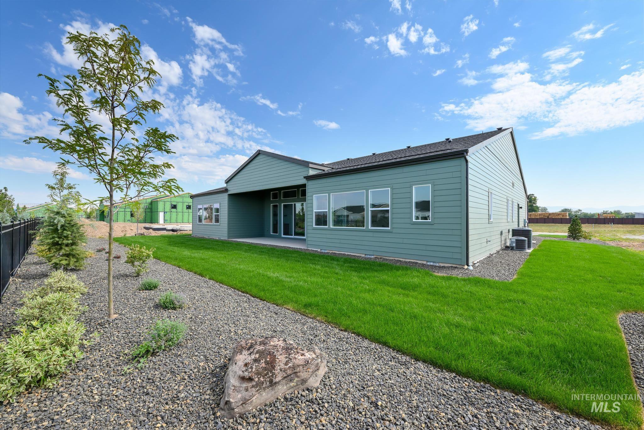 Back of property featuring a patio