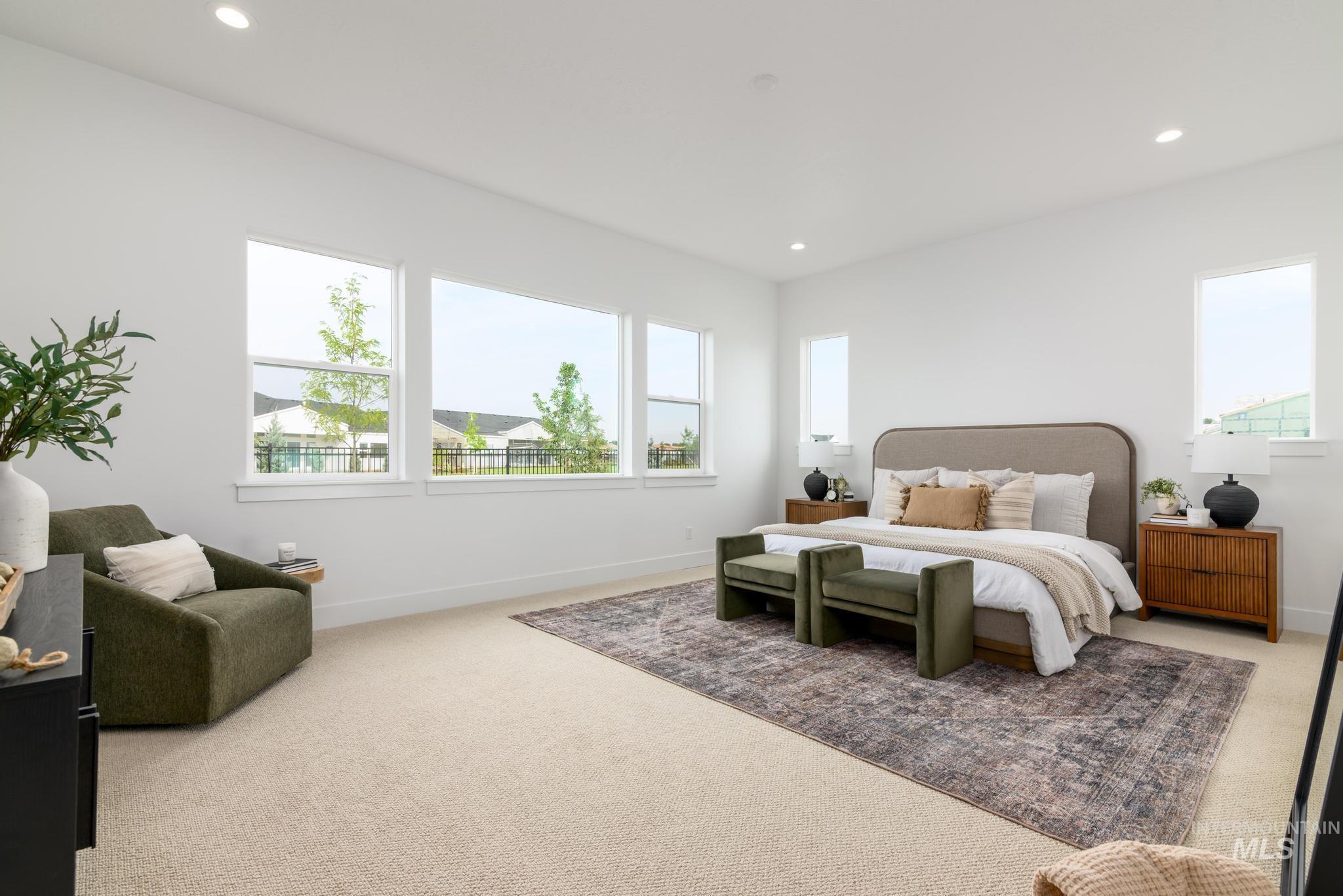 Bedroom featuring light colored carpet and recessed lighting