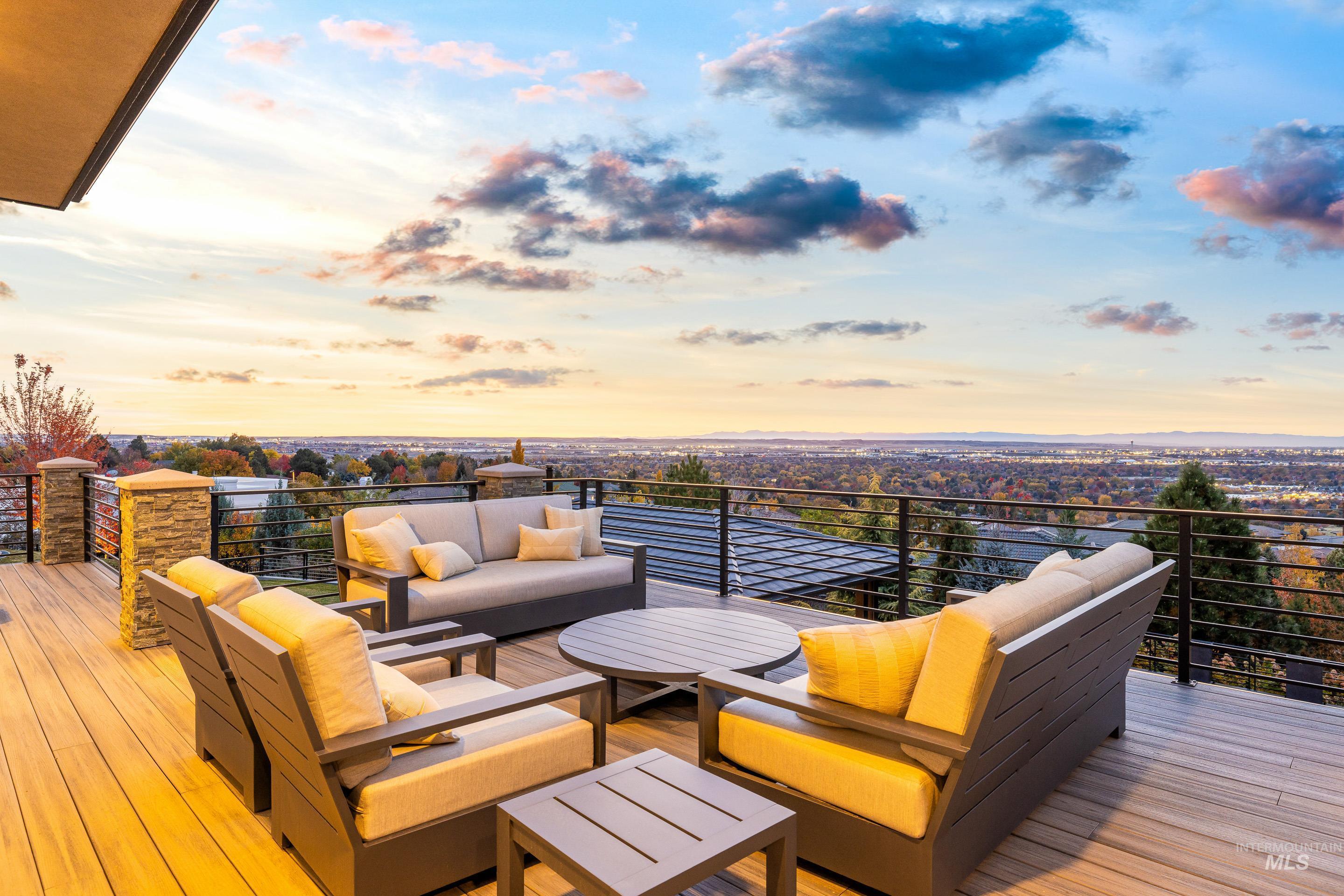 Deck at dusk with an outdoor hangout area