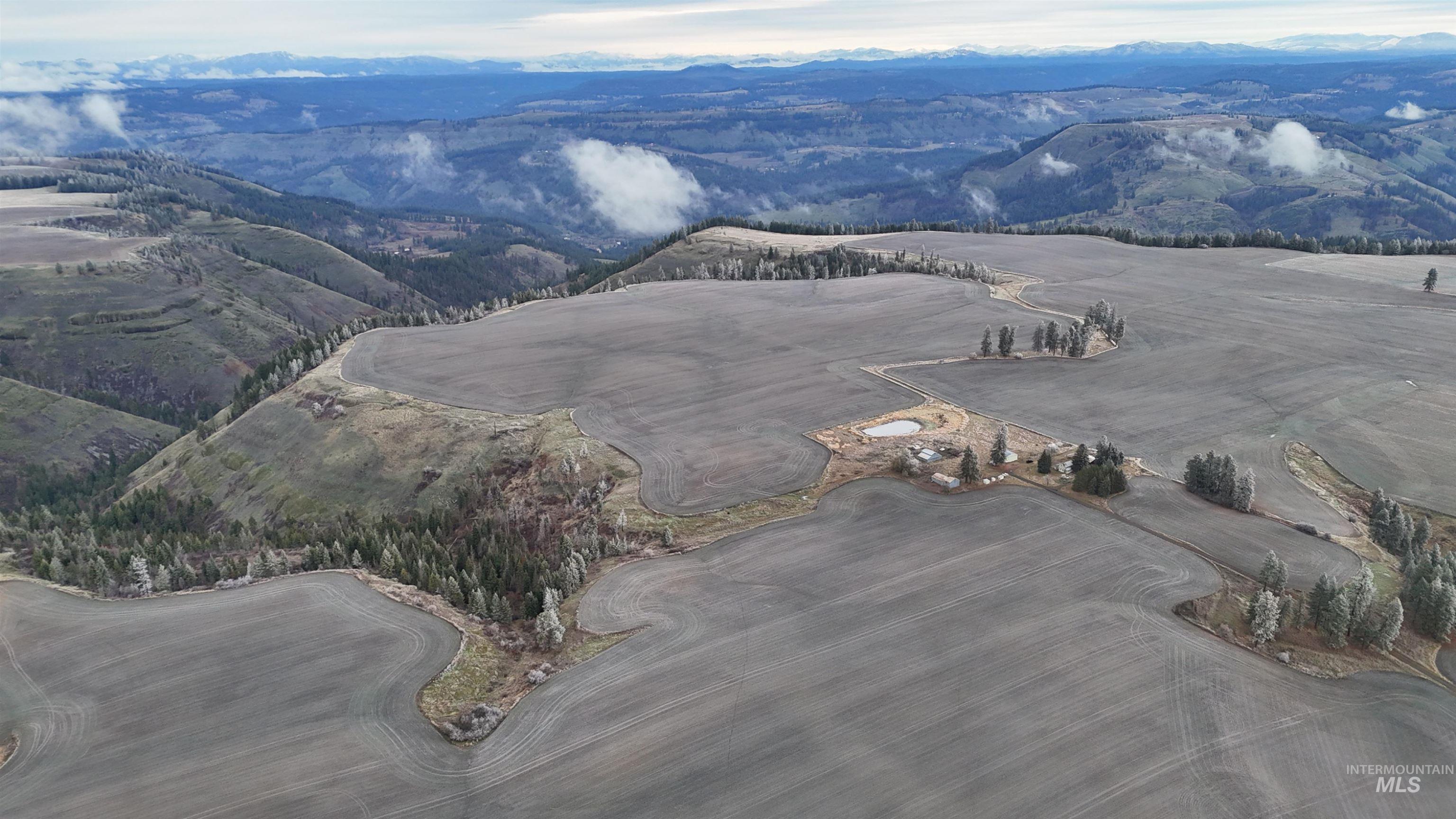 Drone / aerial view of a mountain backdrop