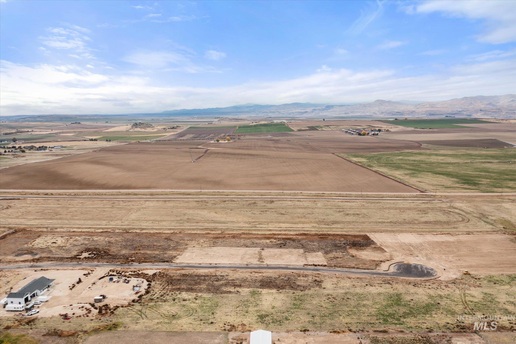 View of rural area with a mountain backdrop