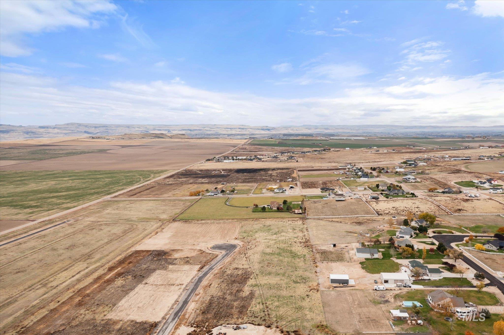 Aerial overview of property's location with rural landscape