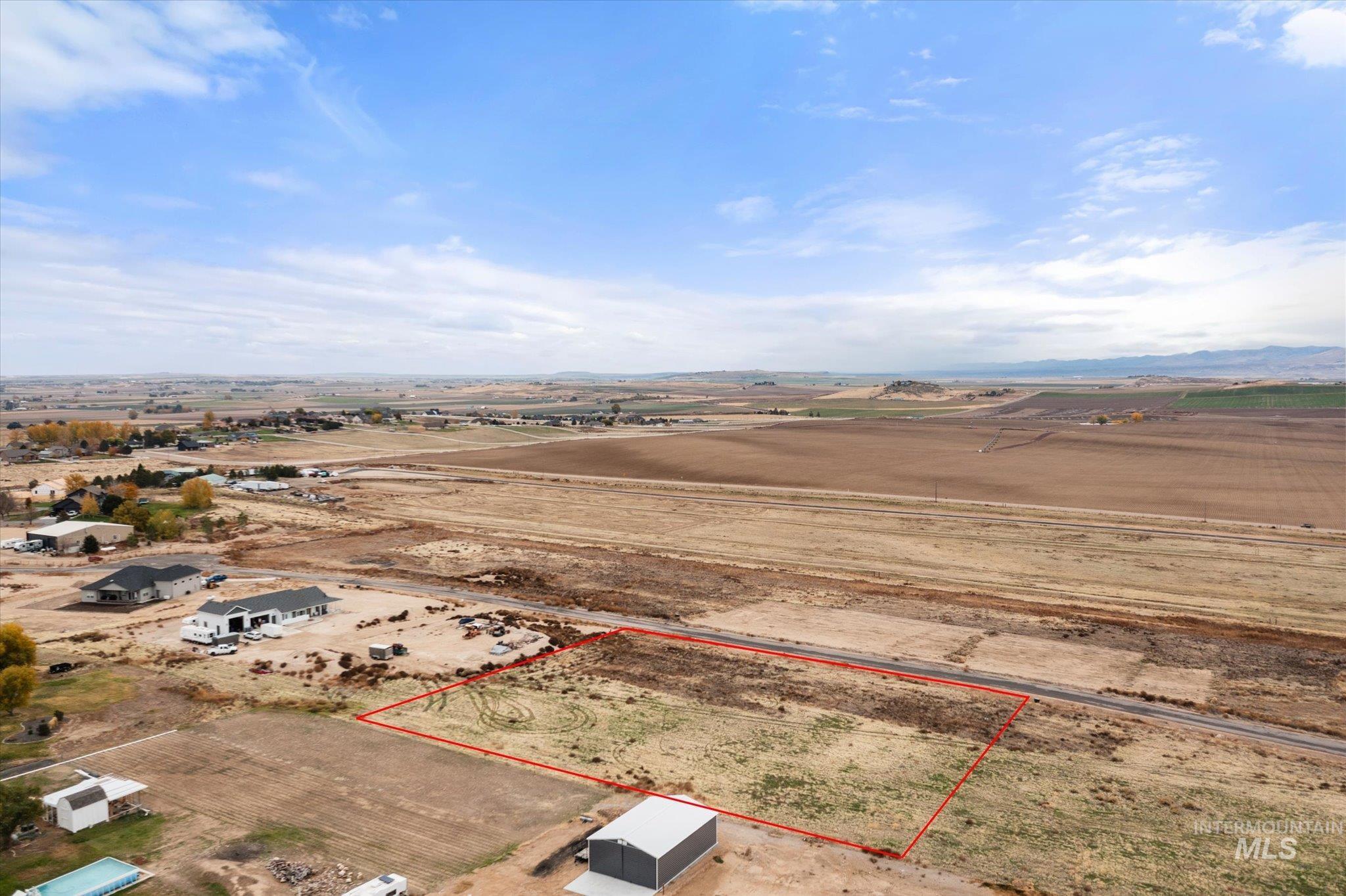 View of rural area with property parcel outlined and a desert landscape