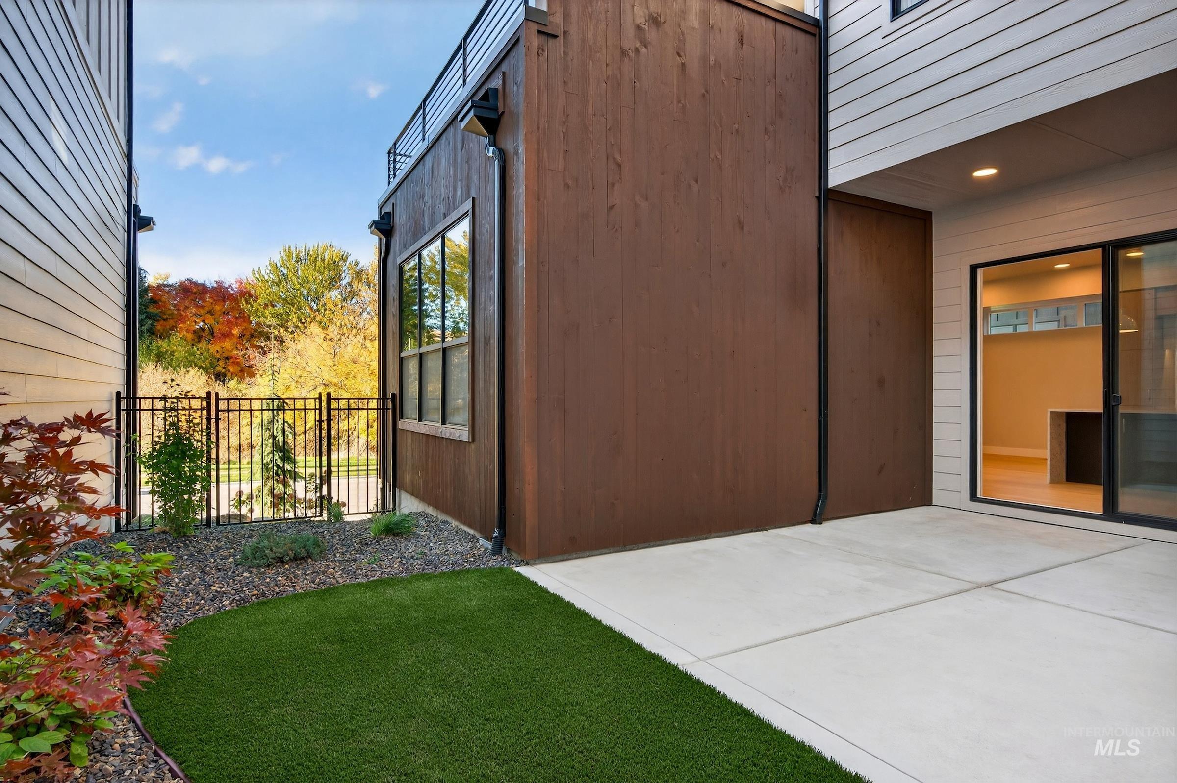 View of property exterior with a patio