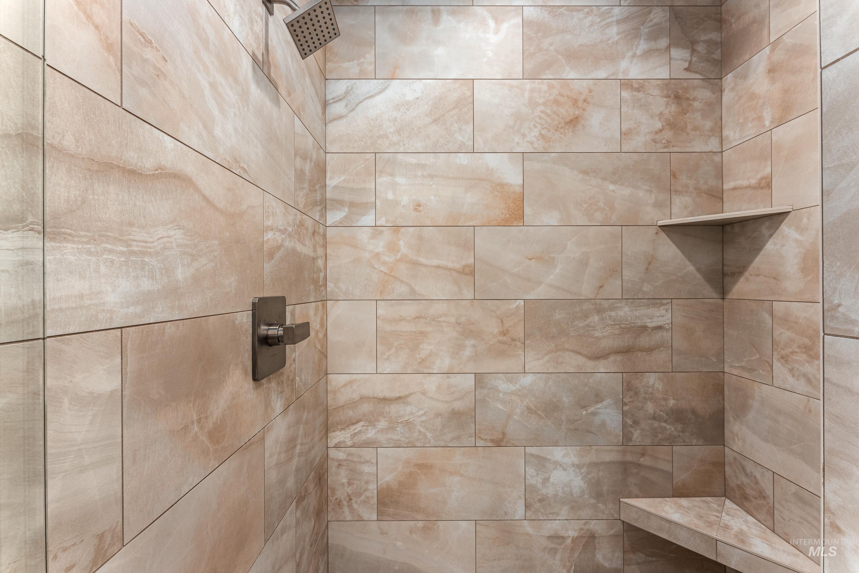 Bathroom view of tiled shower