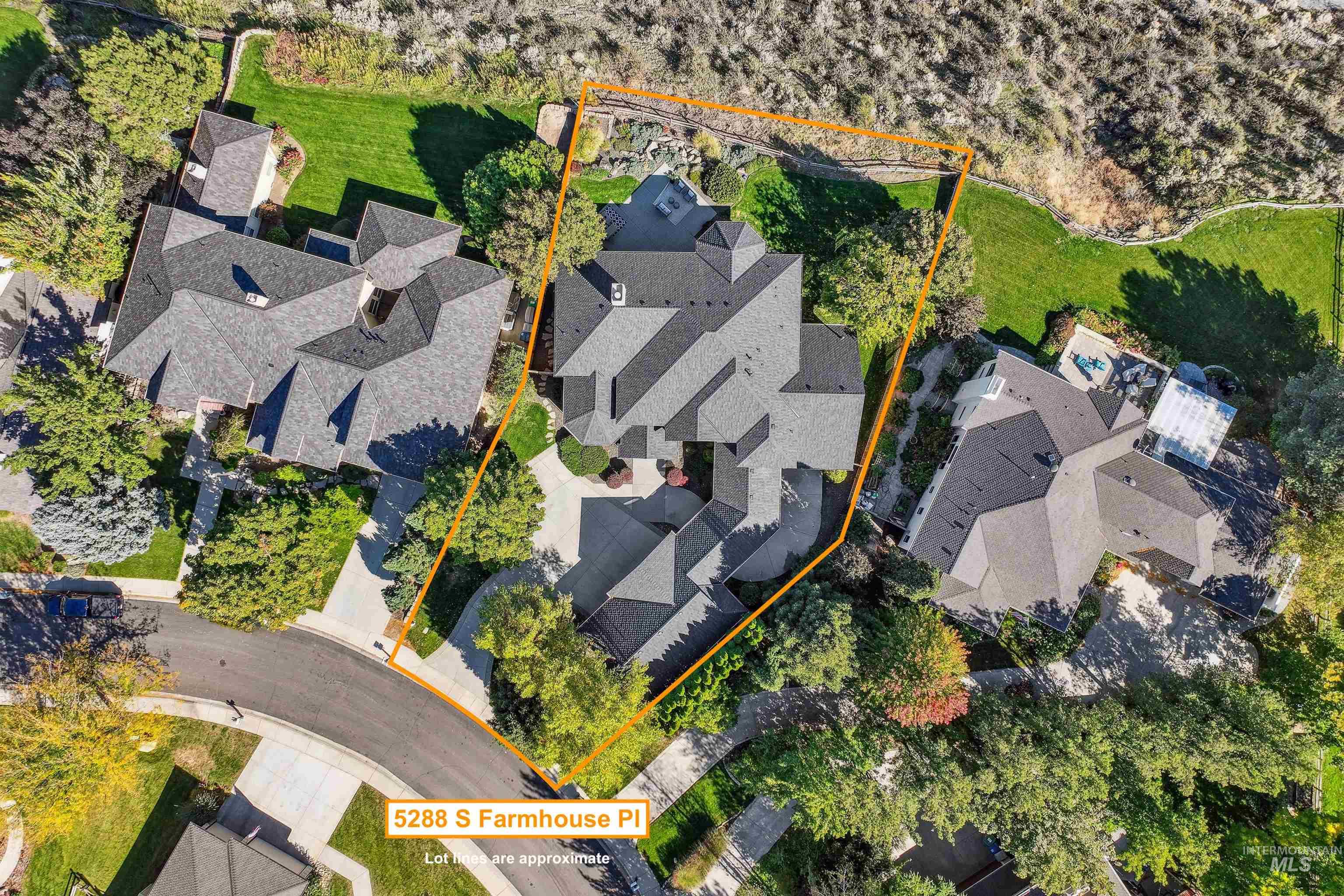 Aerial view of property and surrounding area featuring property parcel outlined