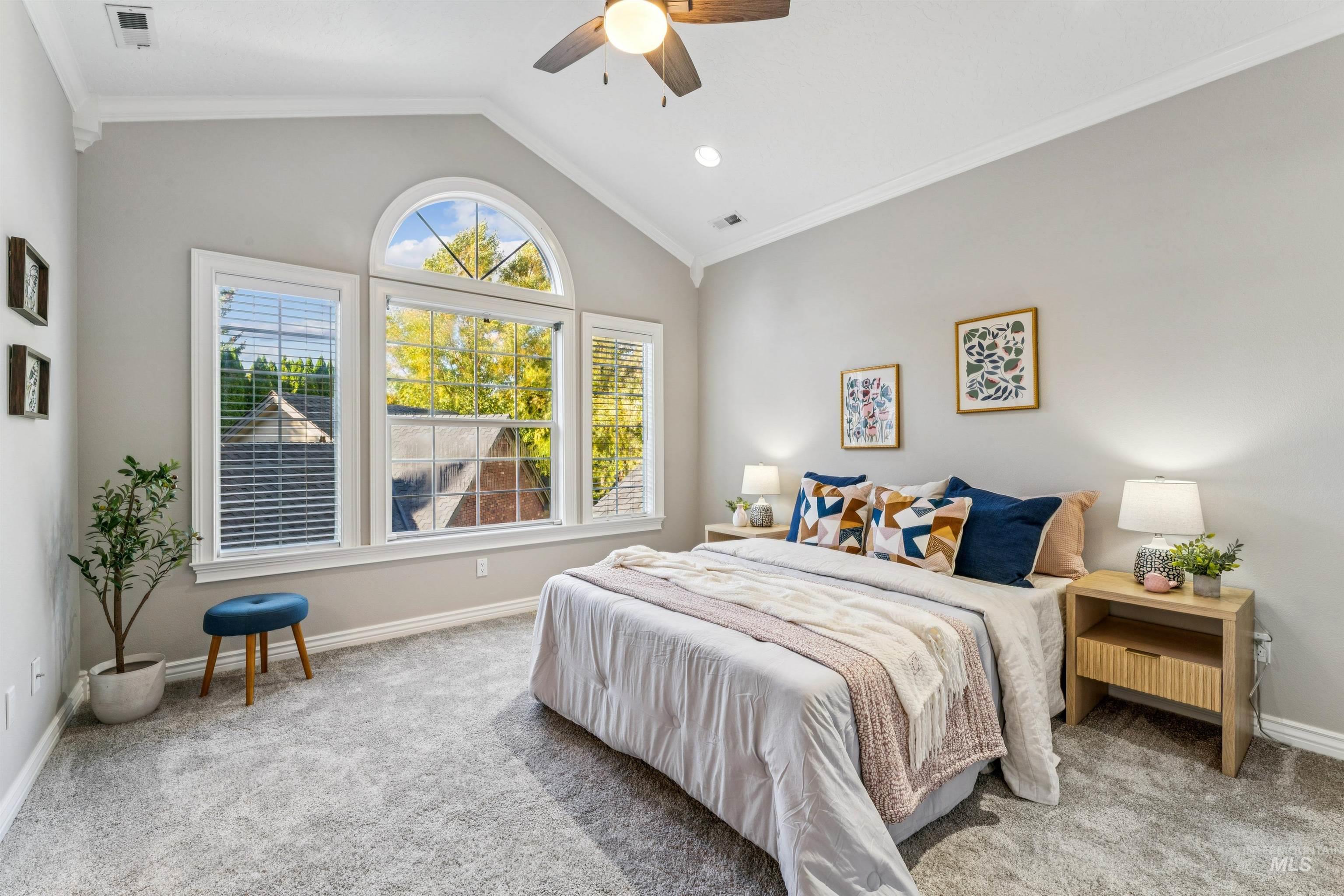 Bedroom featuring crown molding, light carpet, lofted ceiling, a ceiling fan, and recessed lighting