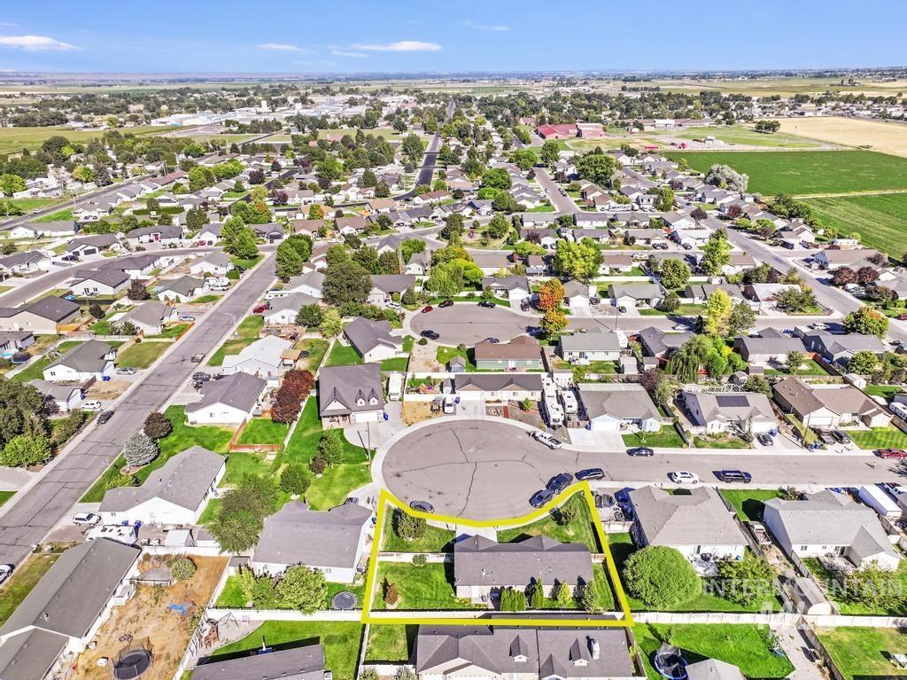 View of property location featuring nearby suburban area and property parcel outlined