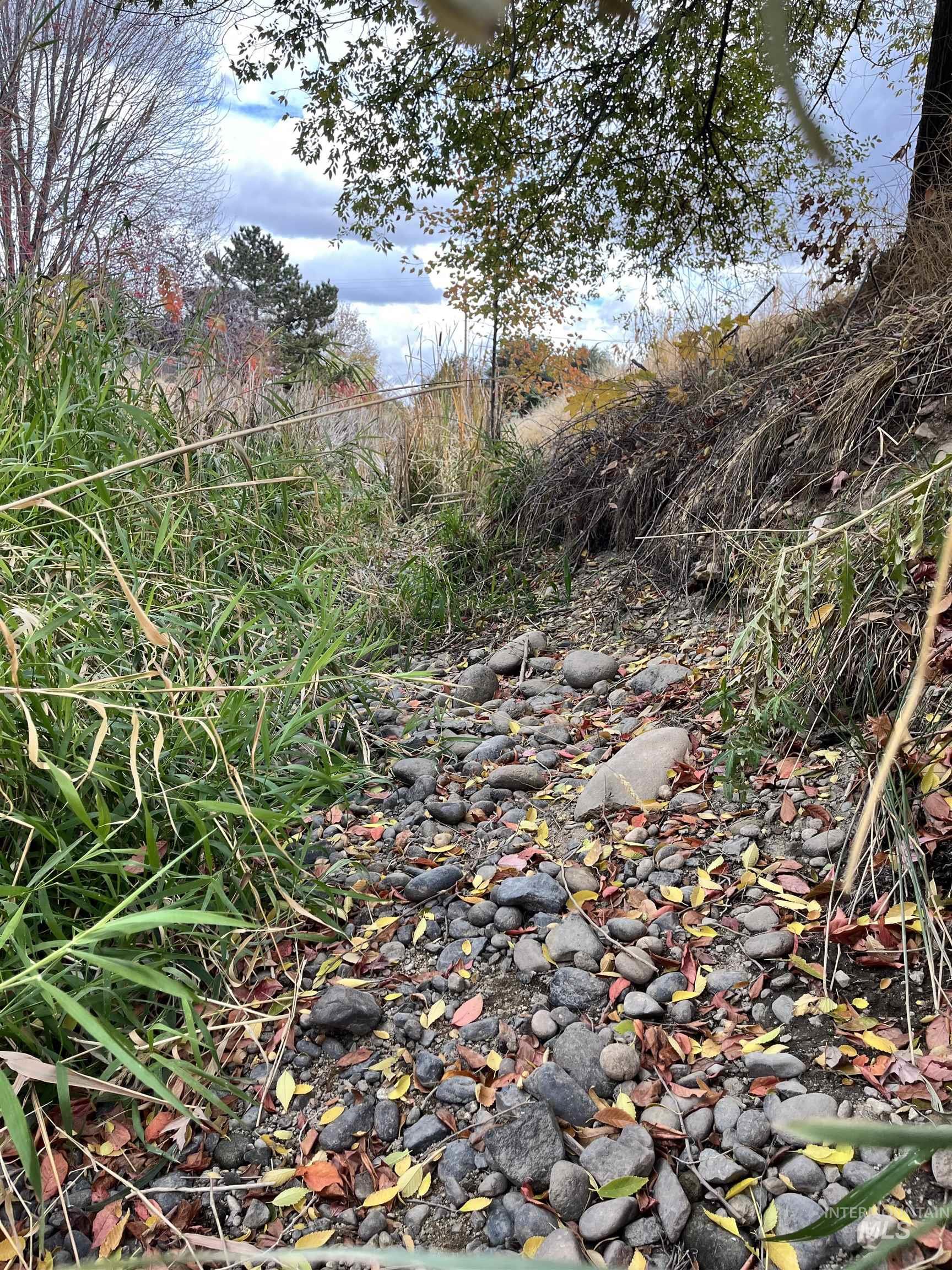 The northern boundary of the small subdivision is bordered by waterway.