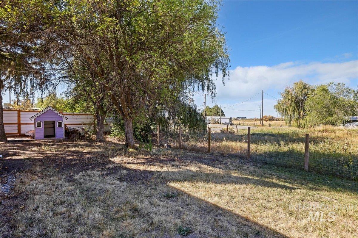 View of yard with a shed