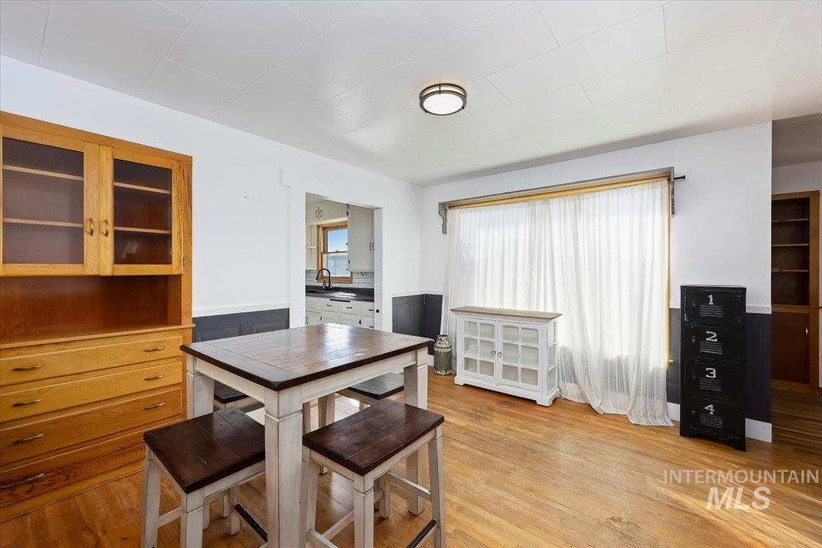 Dining room with light wood finished floors