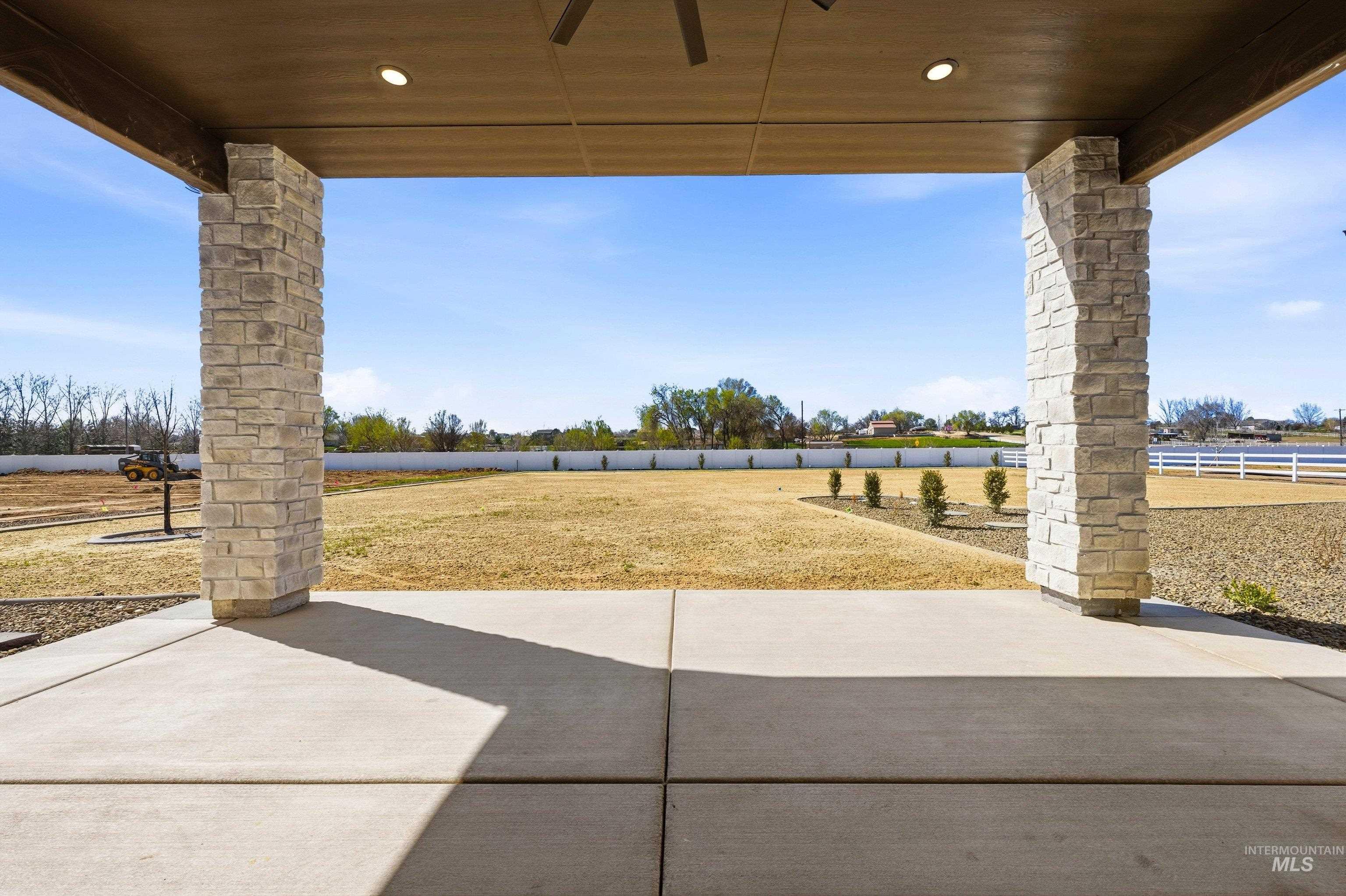 View of patio with a ceiling fan