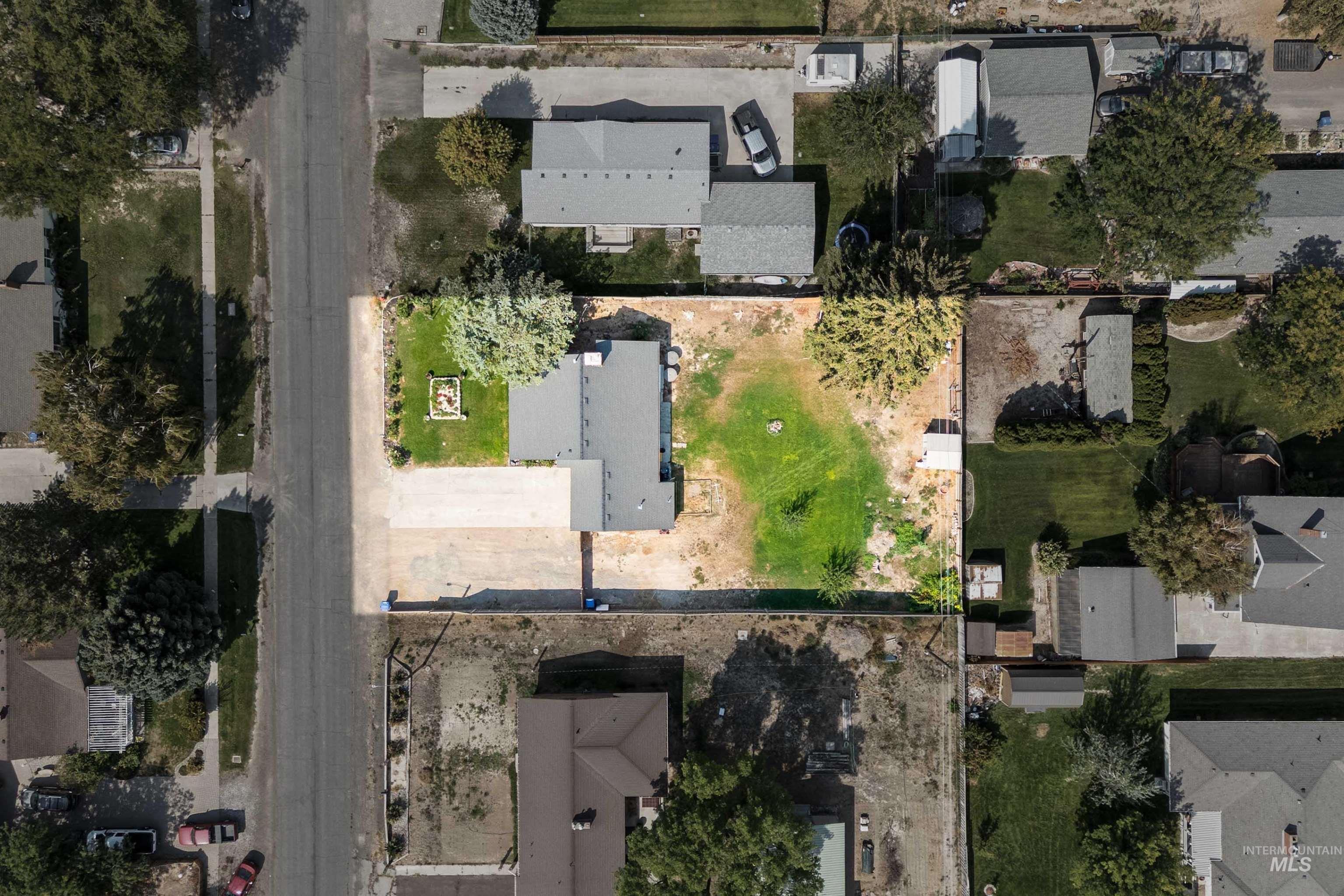 View of property location with nearby suburban area