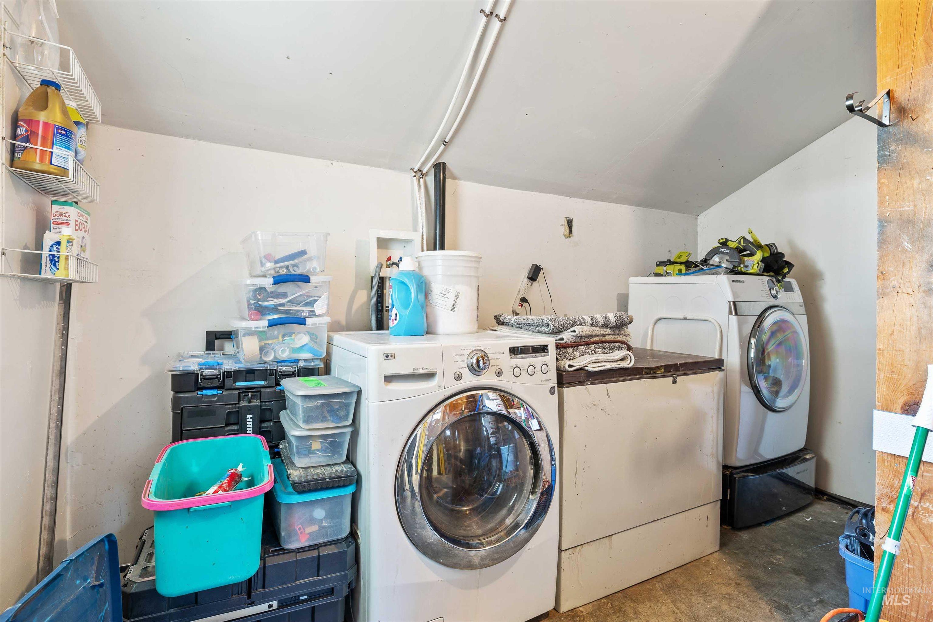 Laundry room with separate washer and dryer