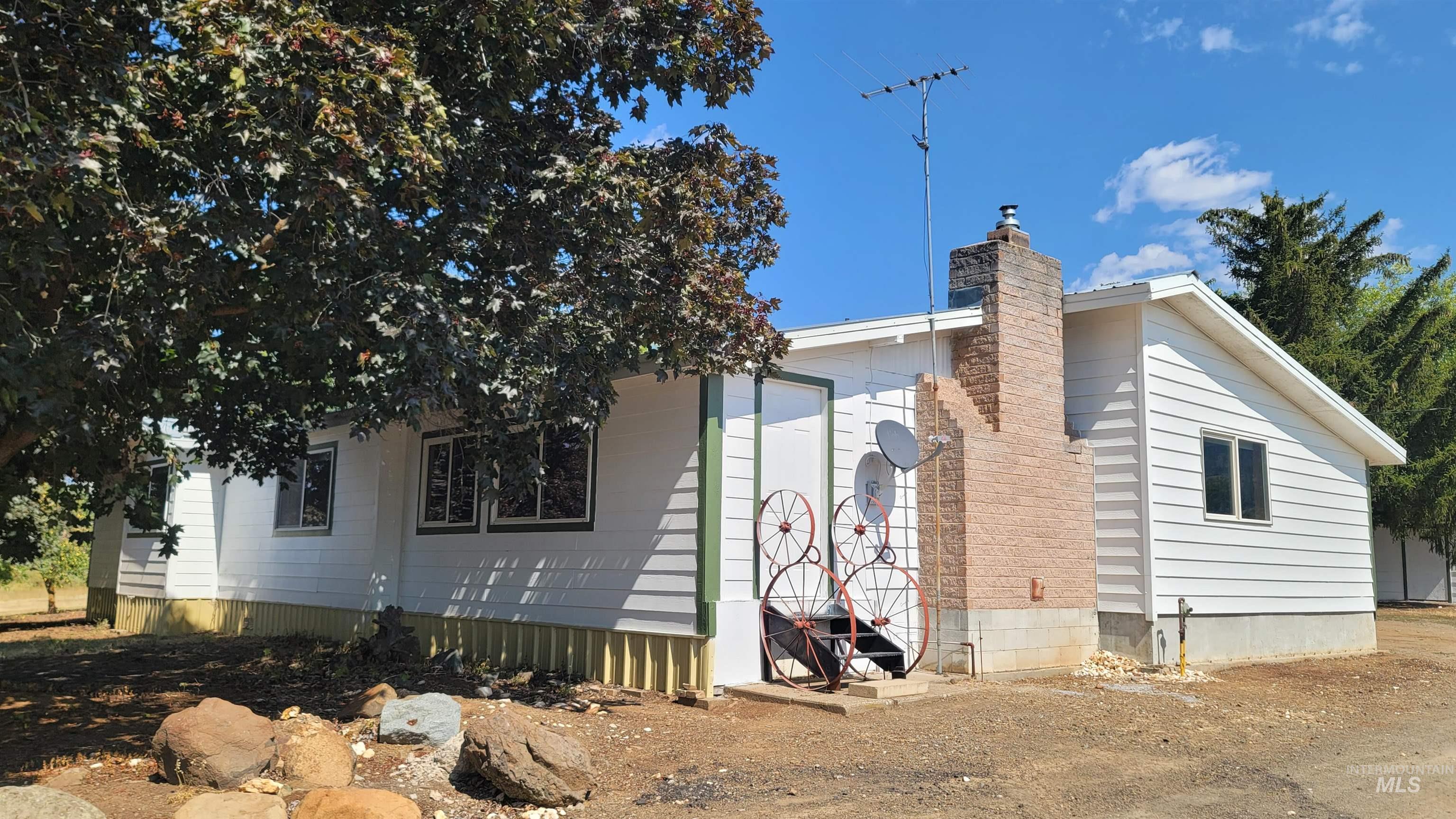 View of front facade with a chimney