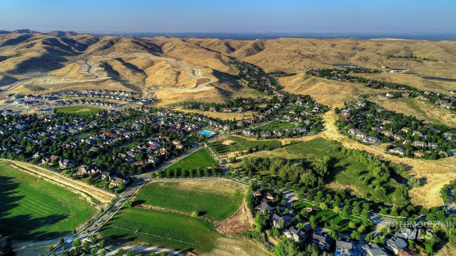 Aerial view of property and surrounding area with rural landscape