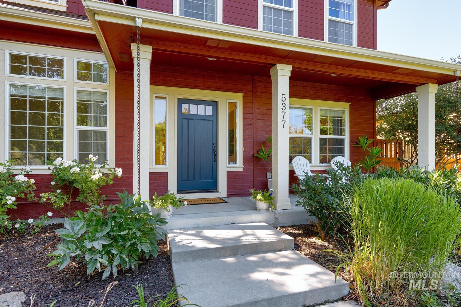Doorway to property with covered porch