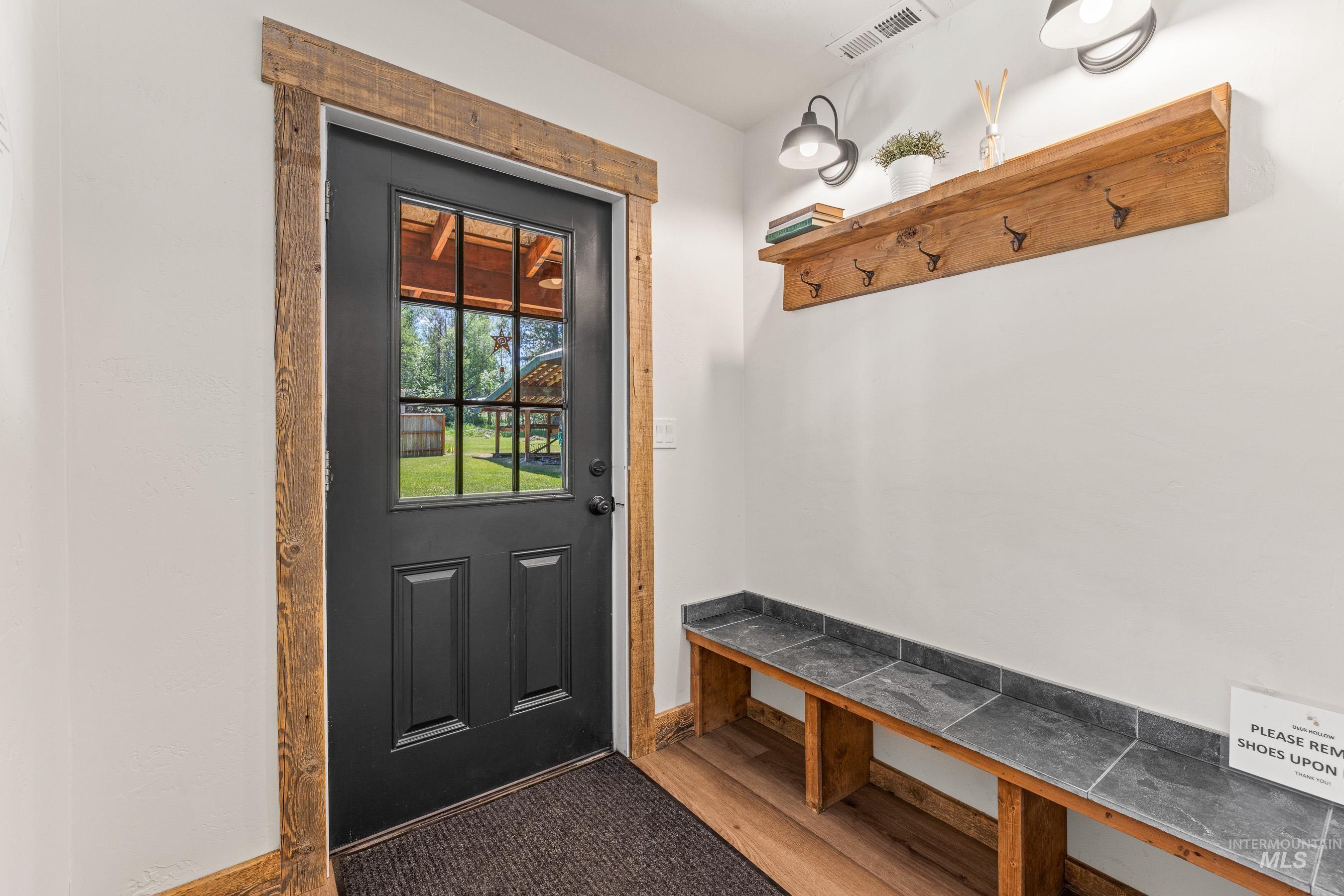 Mudroom featuring wood finished floors