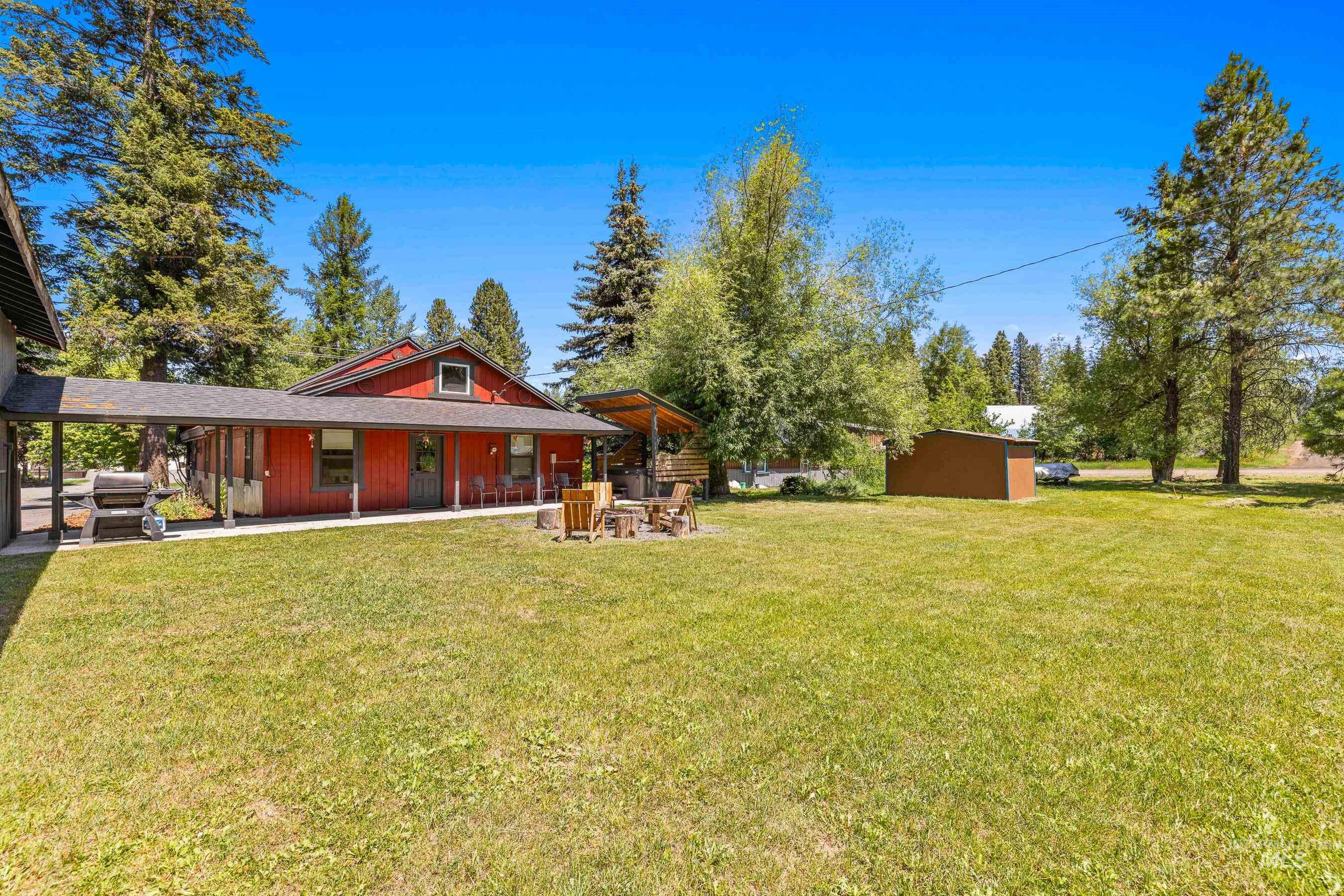 View of green lawn with an outdoor structure