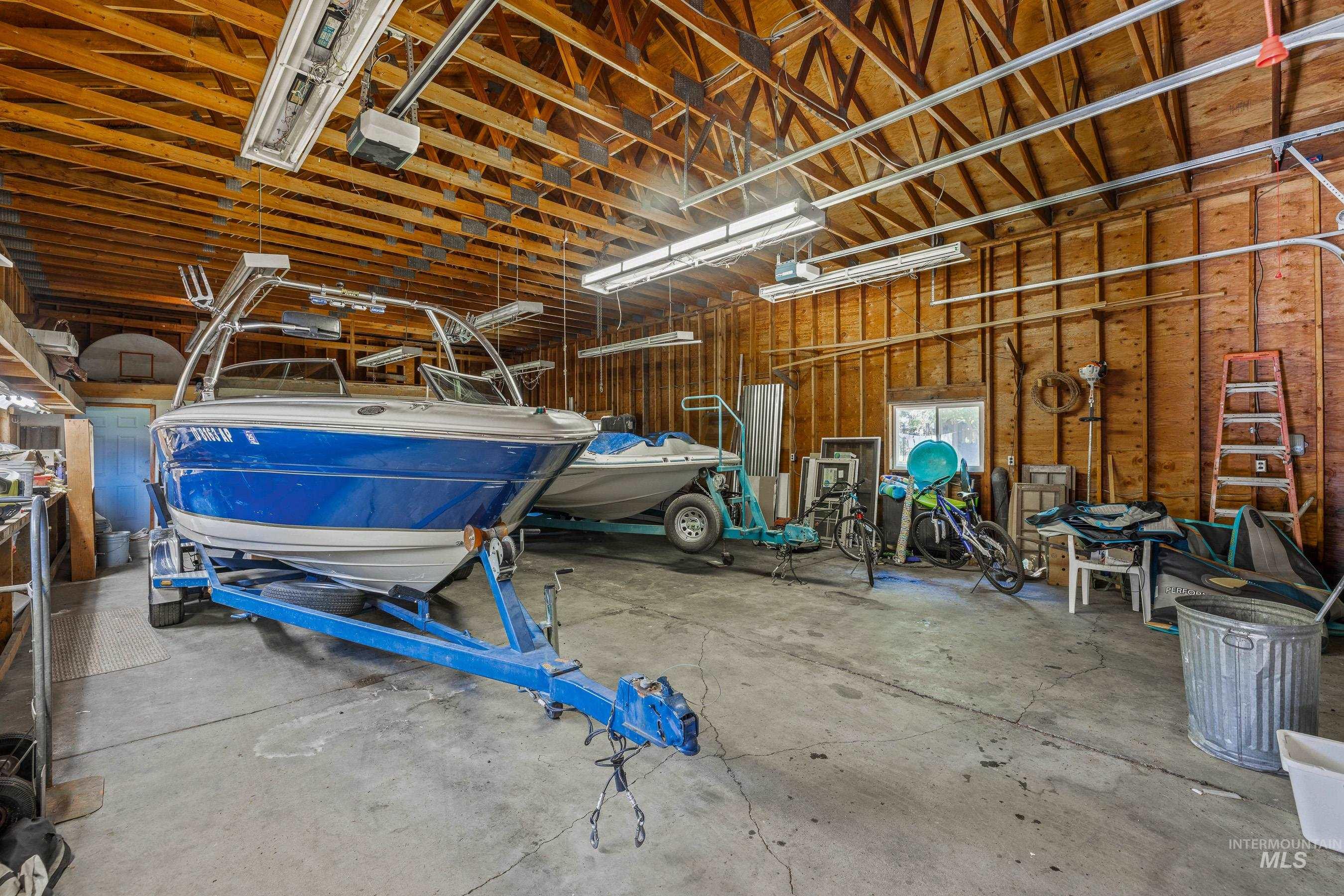 Garage featuring a garage door opener