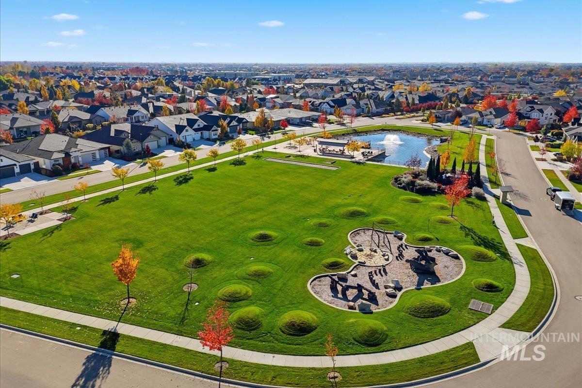 Aerial view of residential area featuring a community park